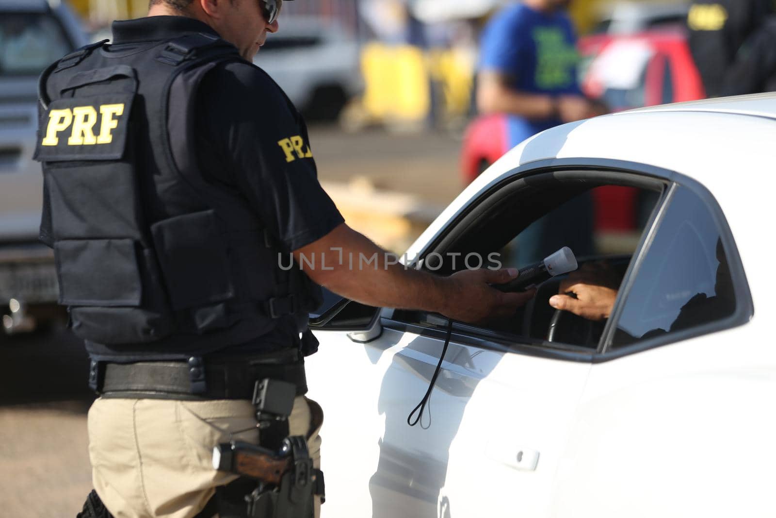 salvador, bahia / brazil - october 11, 2018: Federal Highway Police (PRF) officer approaches the driver on the BR 324 federal highway in Salvador.