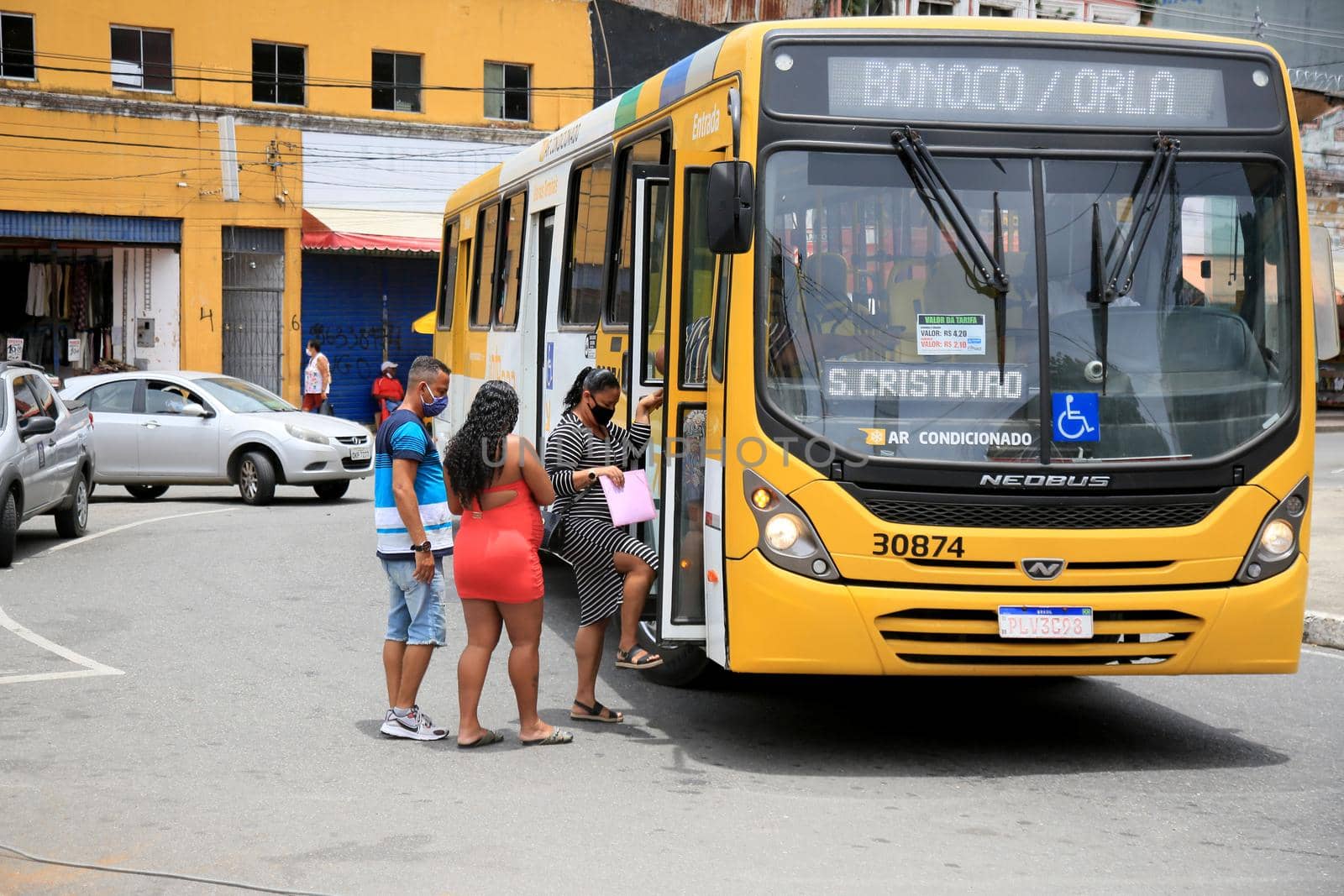 salvador, bahia, brazil - february 8, 2021: people are seen getting on public transport buses at the Barroquinha terminal, in the city of Salvador.