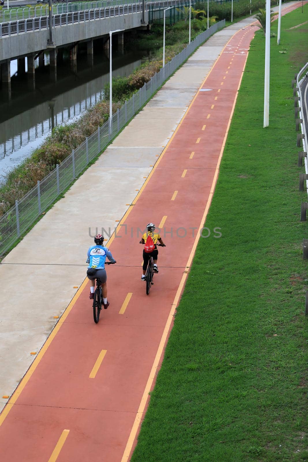 cyclist on bike path in Salvador by joasouza