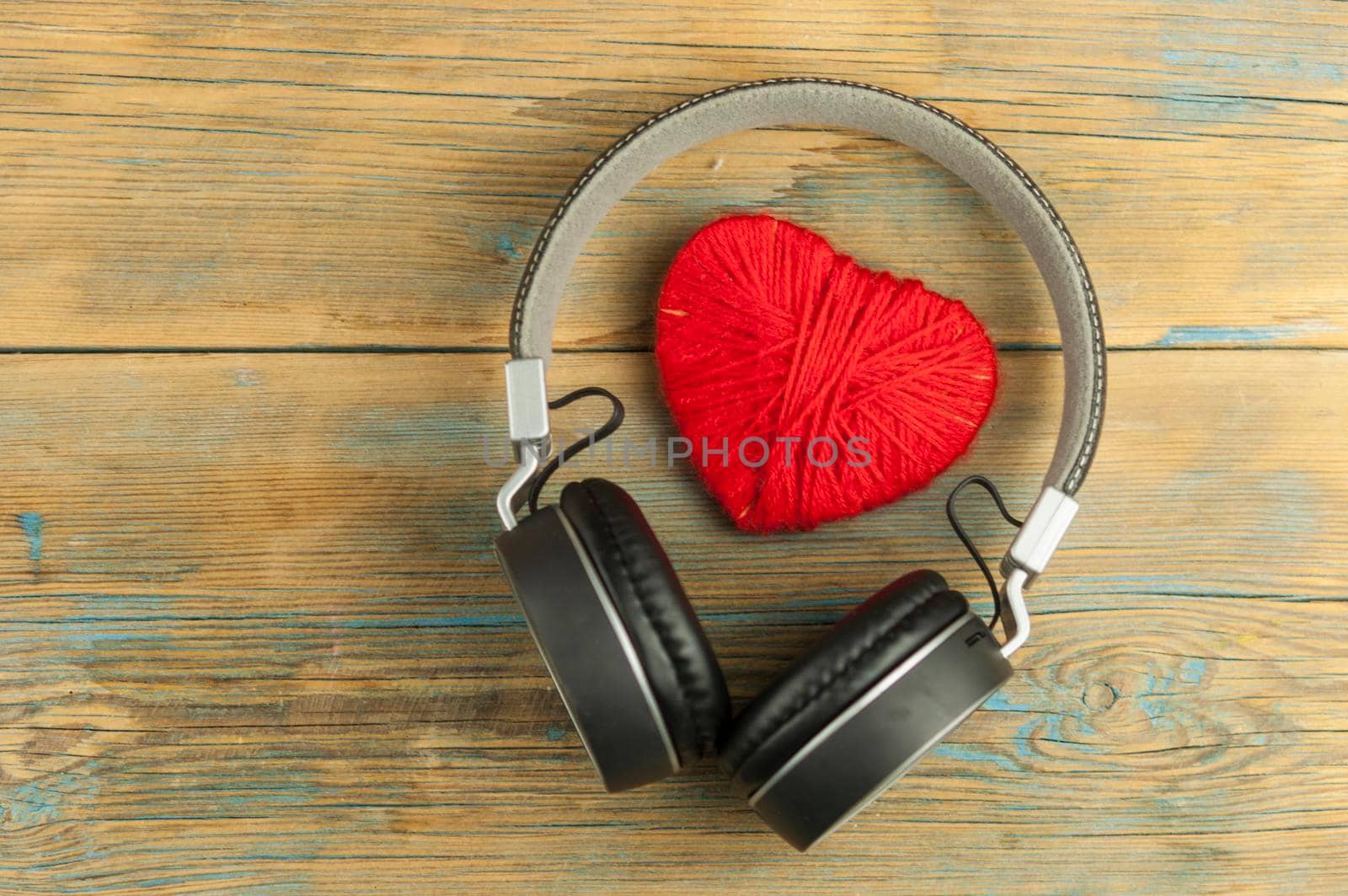 Headphones with red heart. love music