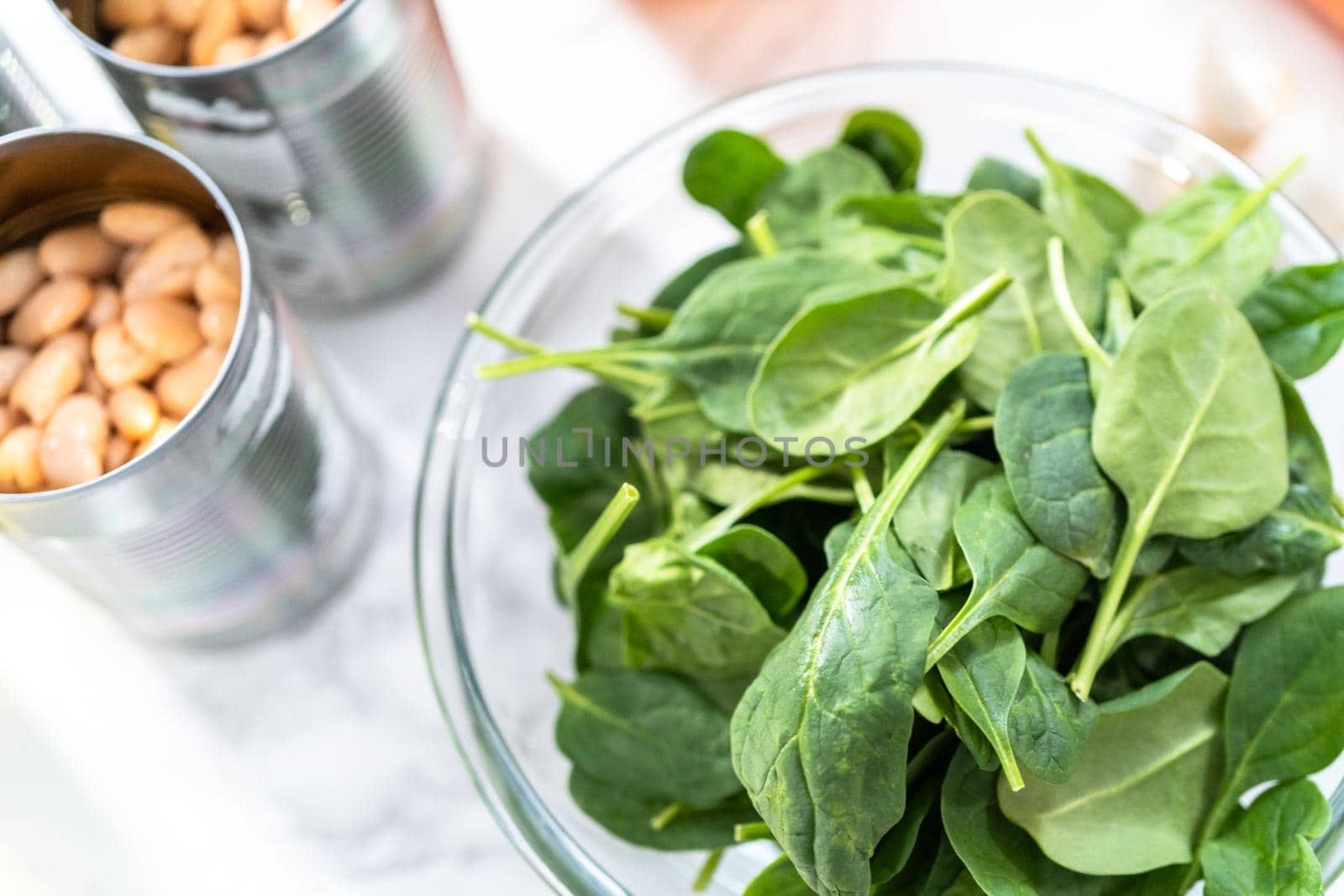 Ingredients to cook vegetarian white bean soup.