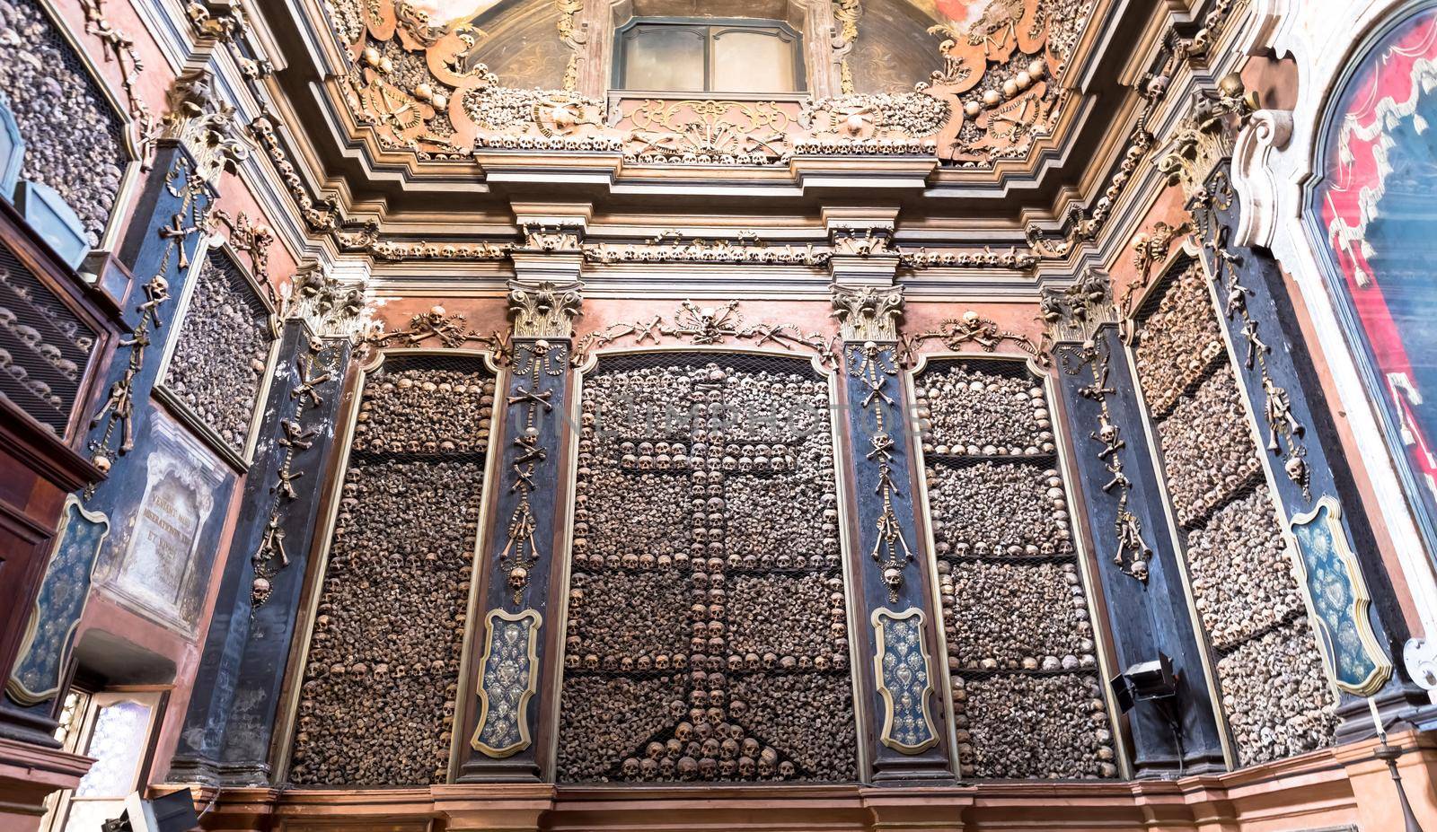 Milan, Italy - Circa August 2020. Ossuary Chapel in San Bernardino alle Ossa Church. Every architectural detail is clad in human bones.