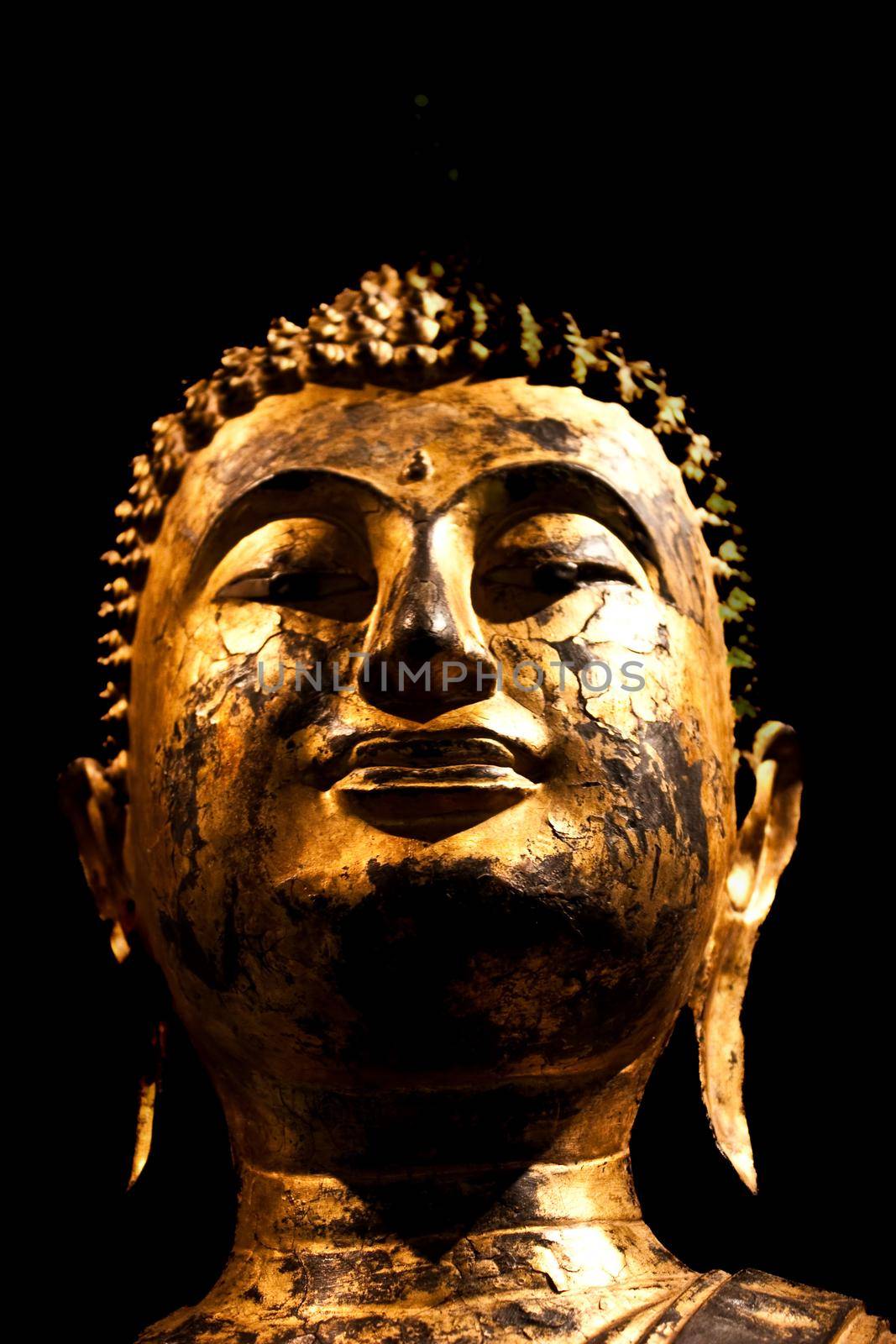 Turin, Italy - Circa August 2021: detail of Sitting Bodhisattva in meditation, 2nd century A.C.