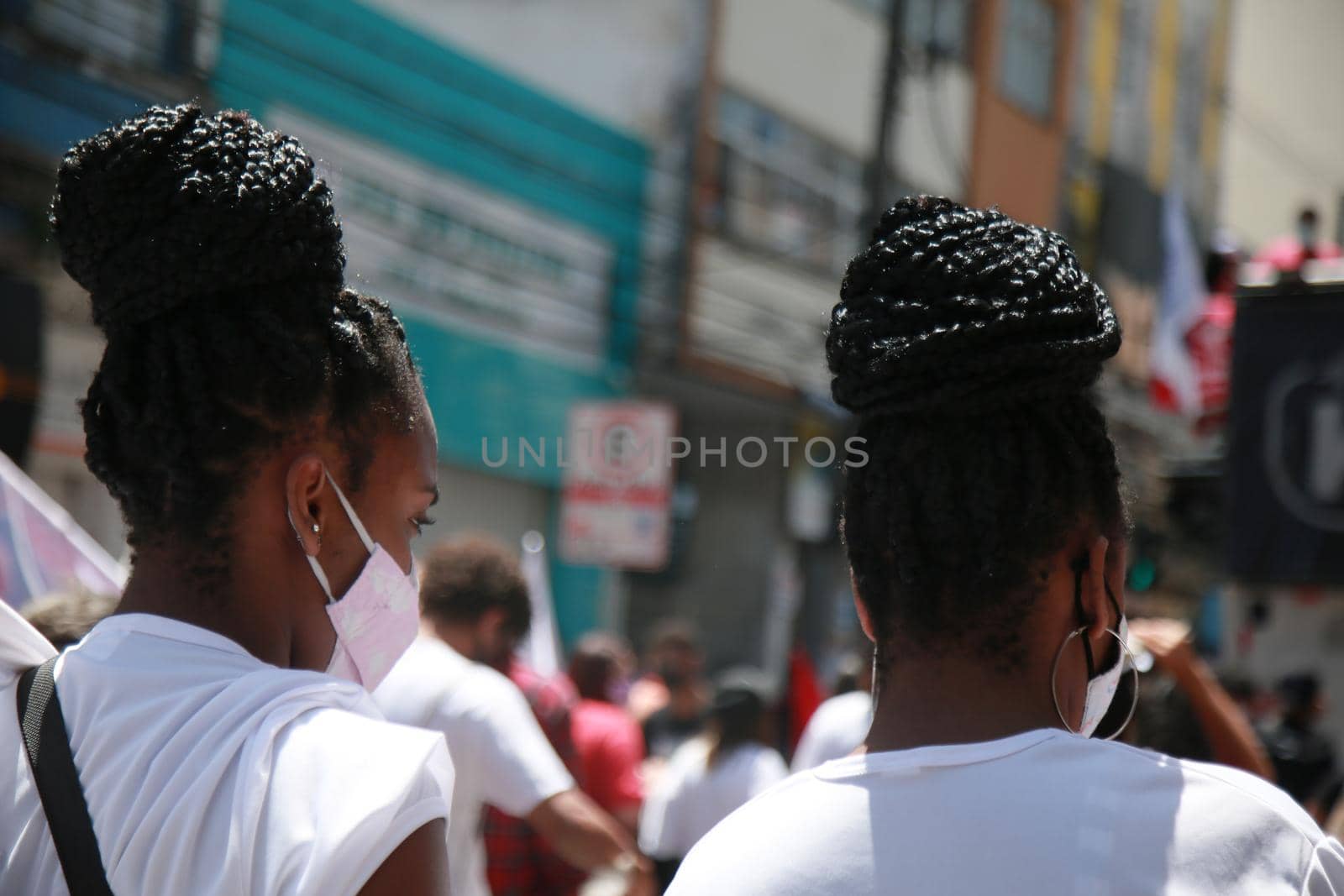 salvador, bahia, brazil - september 7, 2021: young people of black ethnicity wearing hair braids are seen in the city of Salvador.