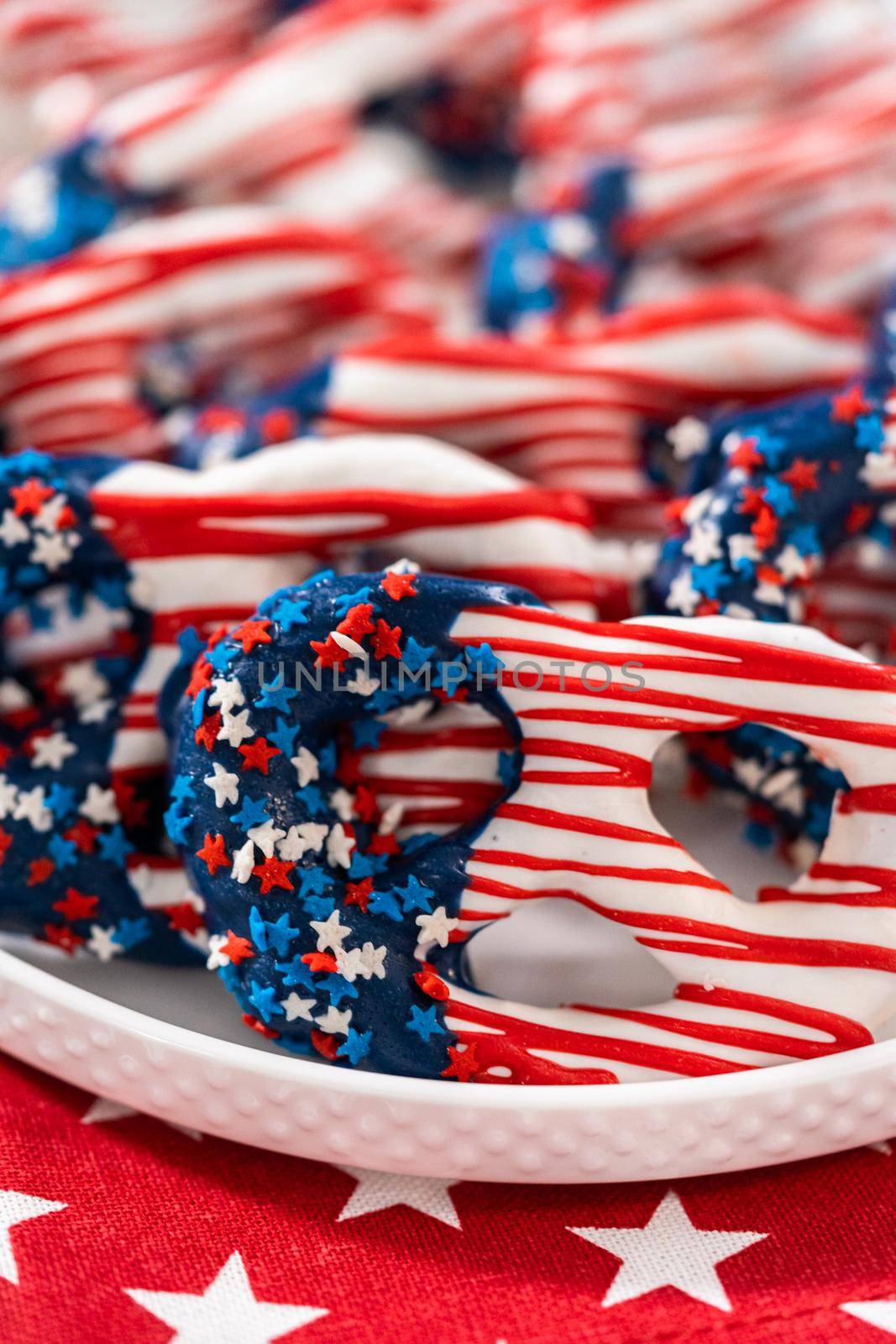 American flag. Red, white, and blue chocolate-covered pretzel twists.