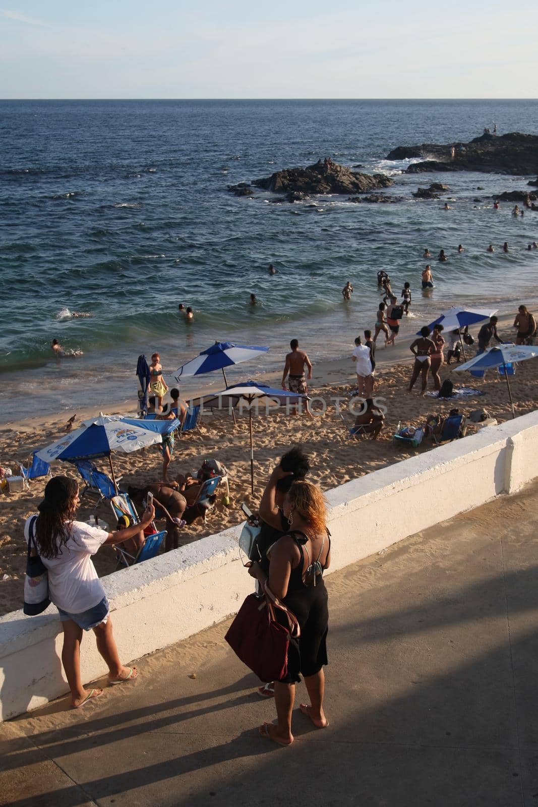 salvador, bahia, brazil - february 5, 2022: people on Barra beach in Salvador city.