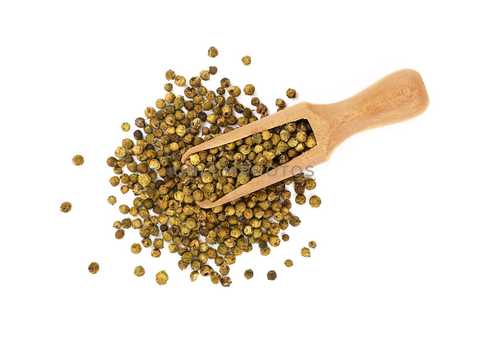 Close up one wooden scoop full of green pepper peppercorns and heap of peppercorns spilled and spread around isolated on white background, elevated top view, directly above