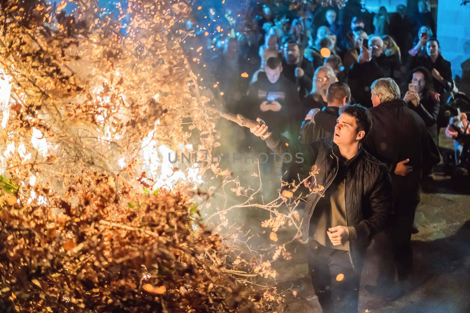 Montenegro, Budva 7.01. 2021: Christian Christmas in Montenegro, the feast of the oak branch. People burn an oak branch in honor of Christmas.