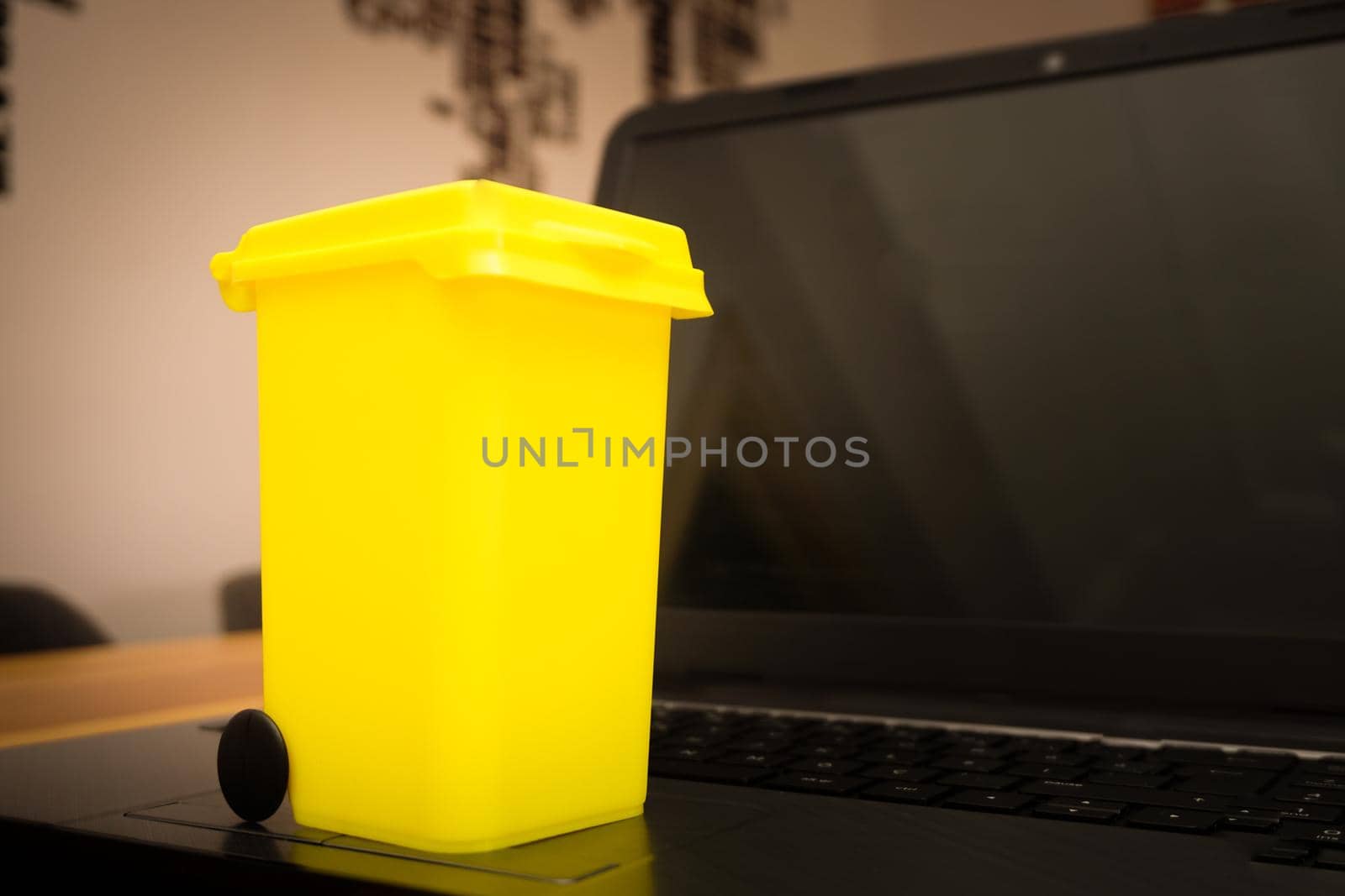 Electronic waste disposal illustration with miniature objects concept shot