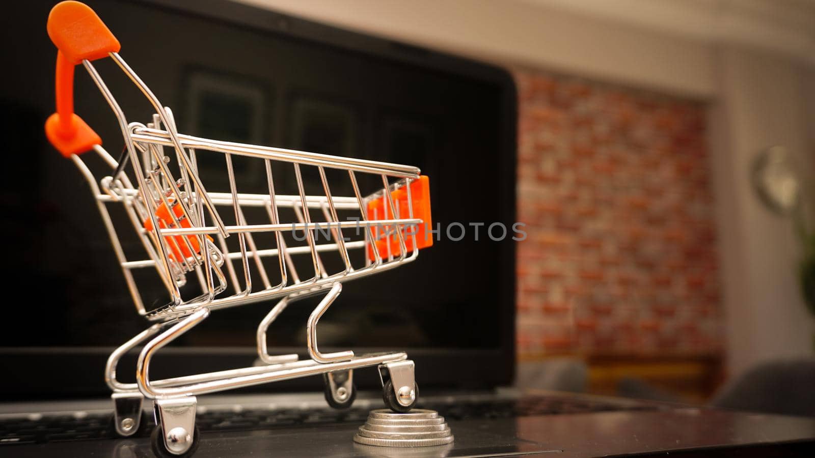 Online shopping illustration concept shot with miniature cart by tasci