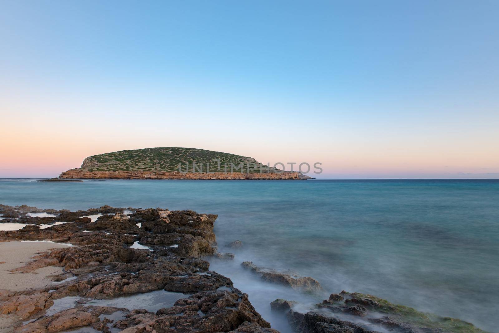 Ibiza sunshine from Cala Conta Comte in San Jose at Balearic Islands Spain.