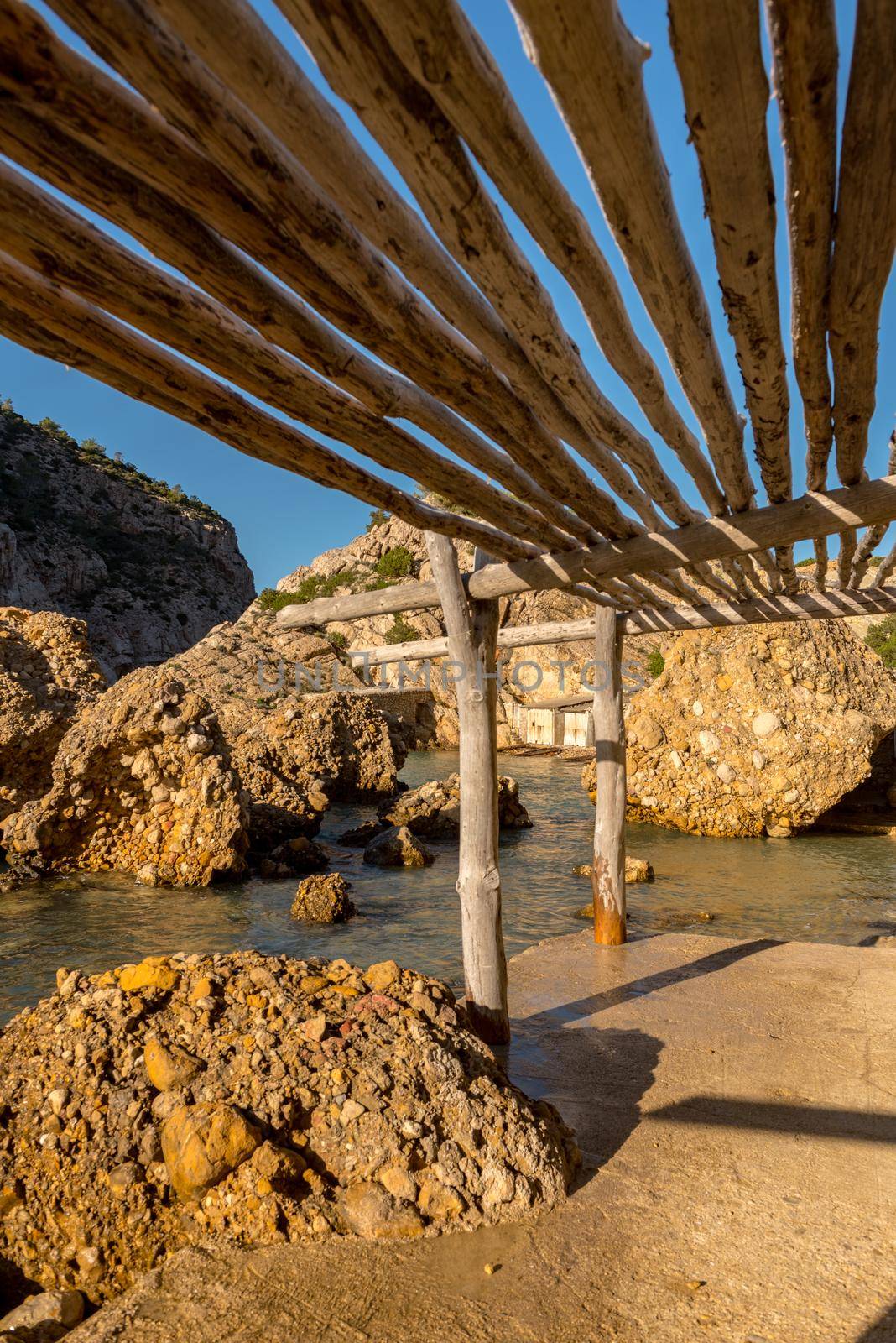 Turquoise waters in Es Portitxol, Ibiza, Spain. Hidden bay on the Island of Ibiza, in Sant Joan de Labritja.