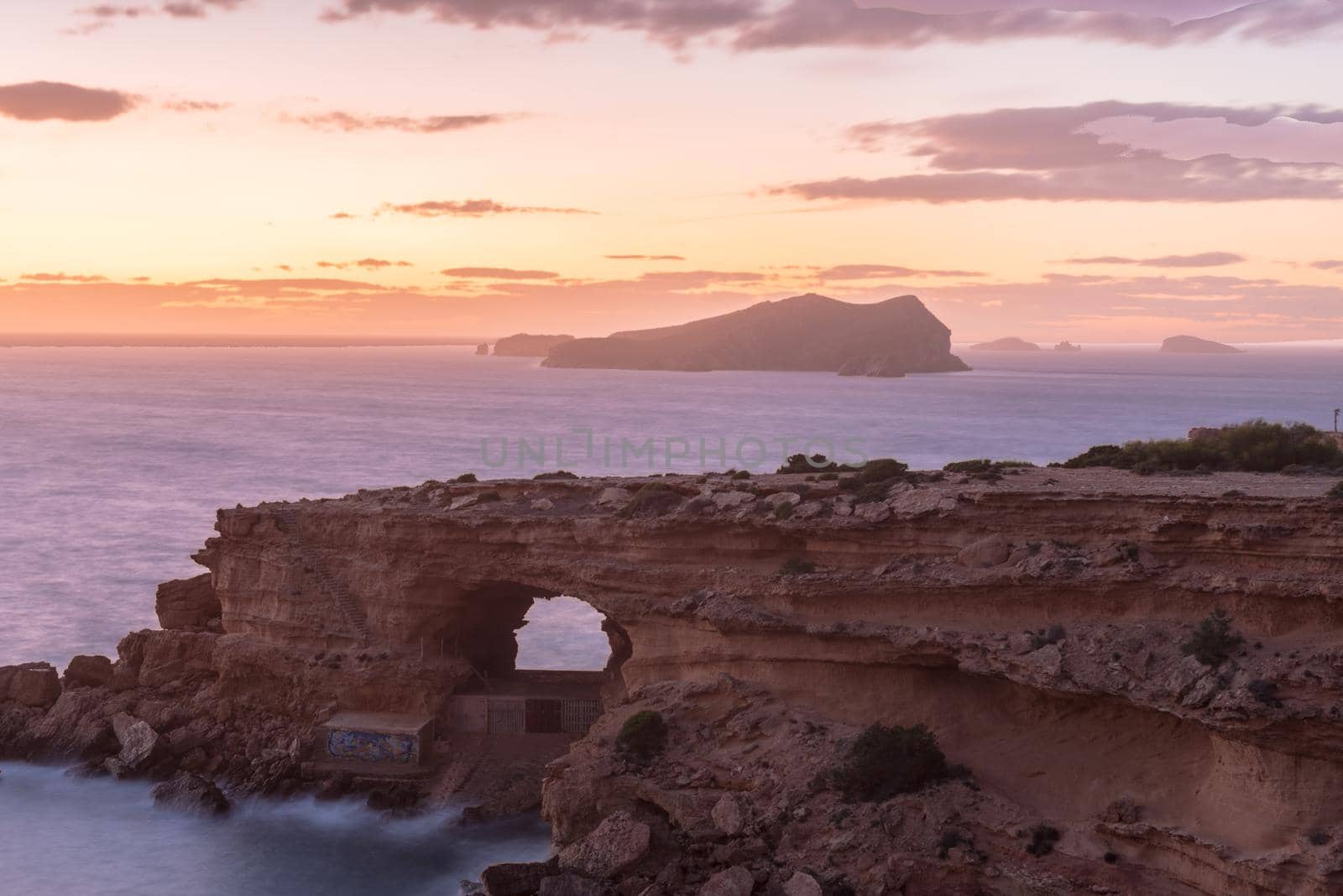 Ibiza sunset from Cala Conta Comte in San Jose at Balearic Islands Spain.