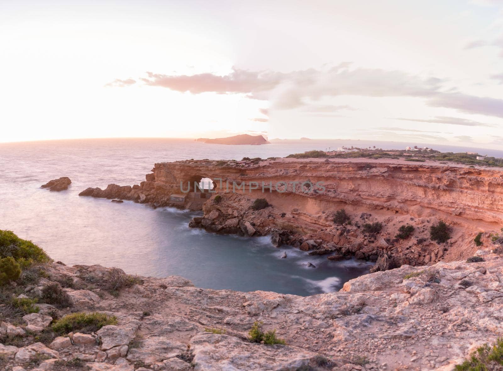 Ibiza sunset from Cala Conta Comte in San Jose at Balearic Islands Spain.