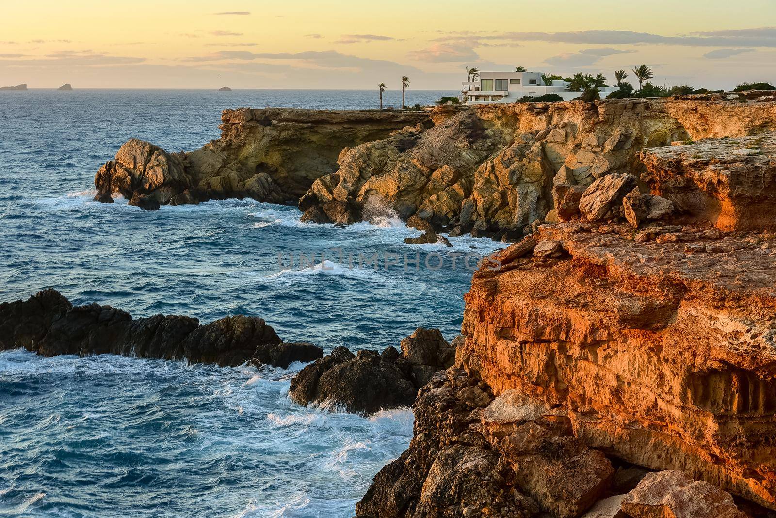 Ibiza sunset from Cala Conta Comte in San Jose at Balearic Islands Spain.