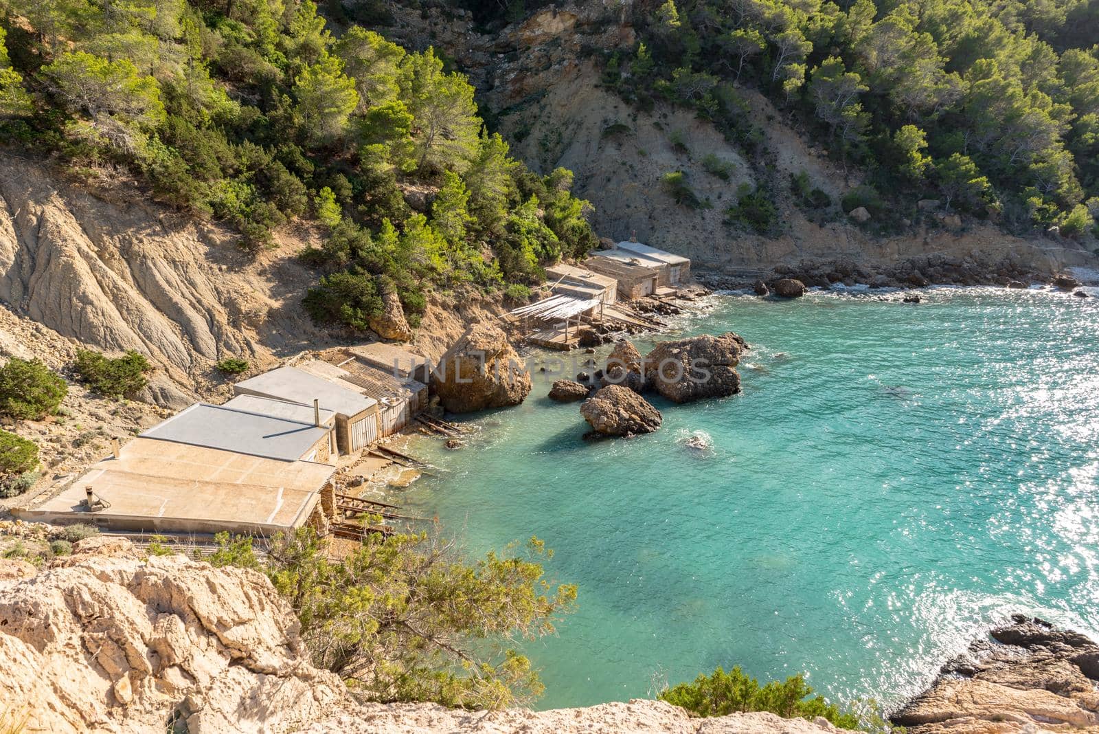 Turquoise waters in Es Portitxol, Ibiza, Spain. Hidden bay on the Island of Ibiza, in Sant Joan de Labritja.