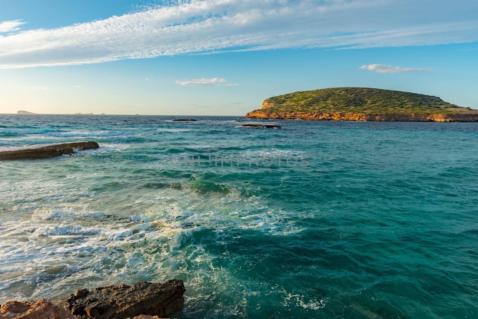 Ibiza sunset from Cala Conta Comte in San Jose at Balearic Islands Spain.