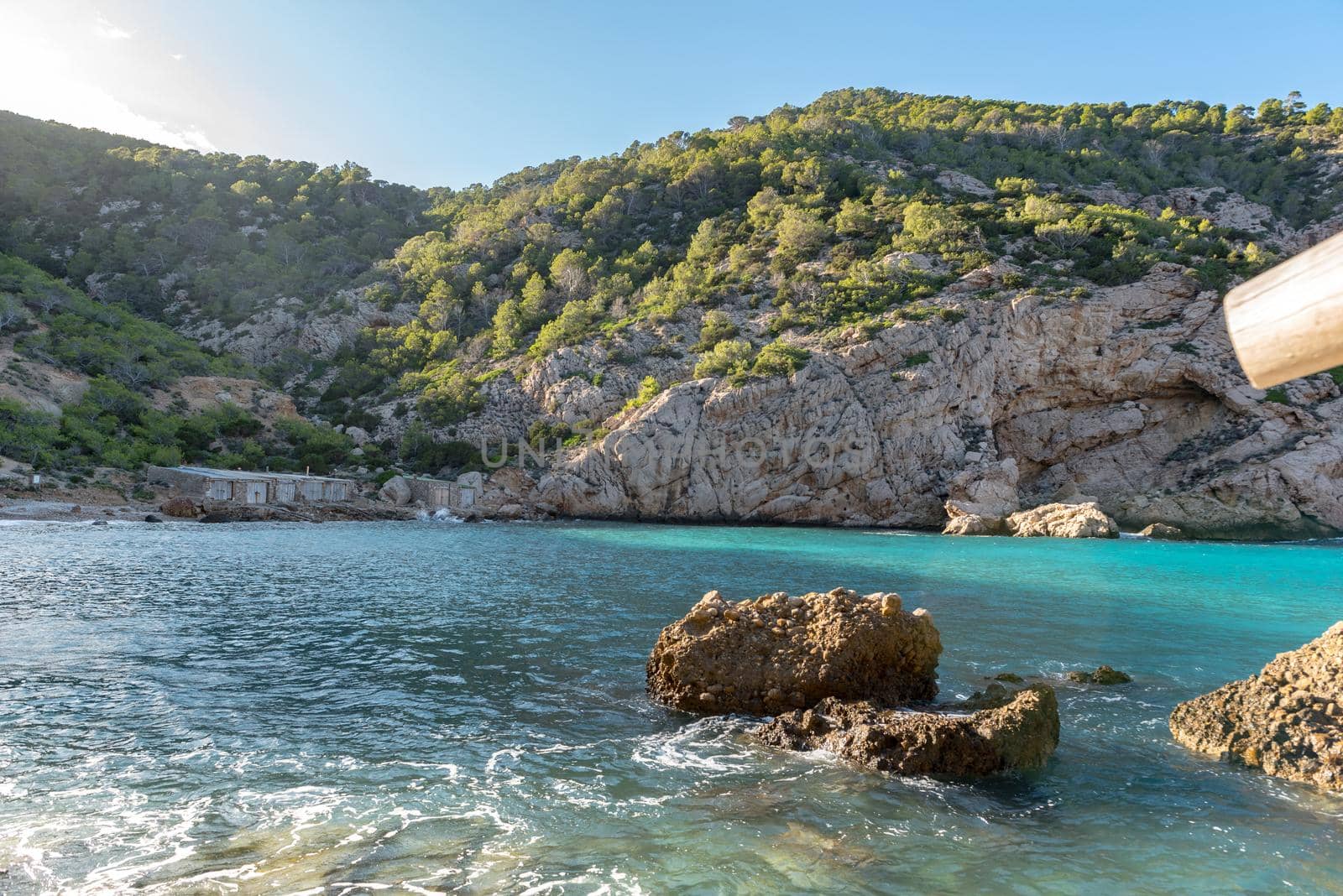 Turquoise waters in Es Portitxol, Ibiza, Spain. Hidden bay on the Island of Ibiza, in Sant Joan de Labritja.