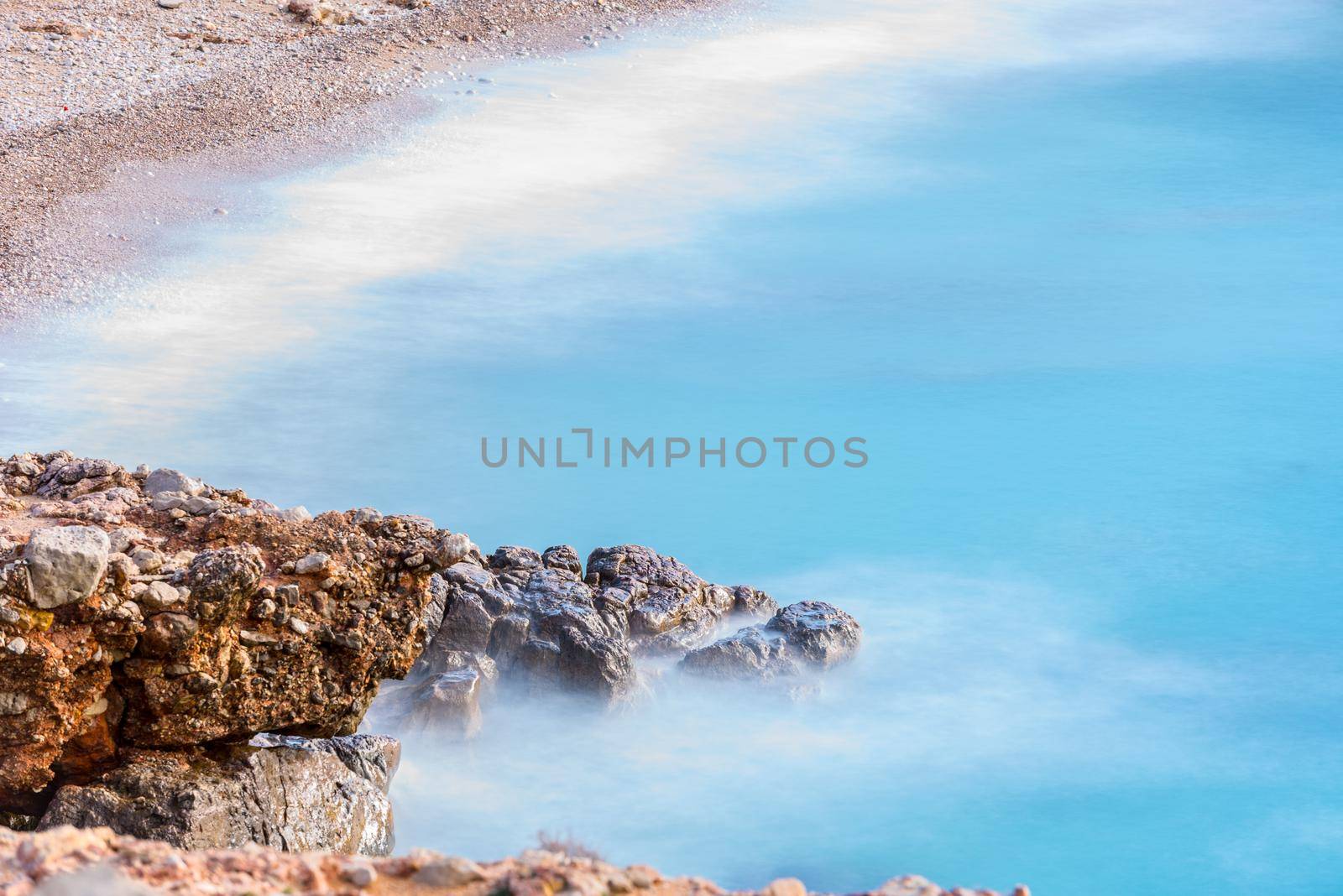 Cala Salada and Saladeta in san Antonio Abad at Balearic Islands Spain. Long exposure, Typical house for fishing boats and rocks.