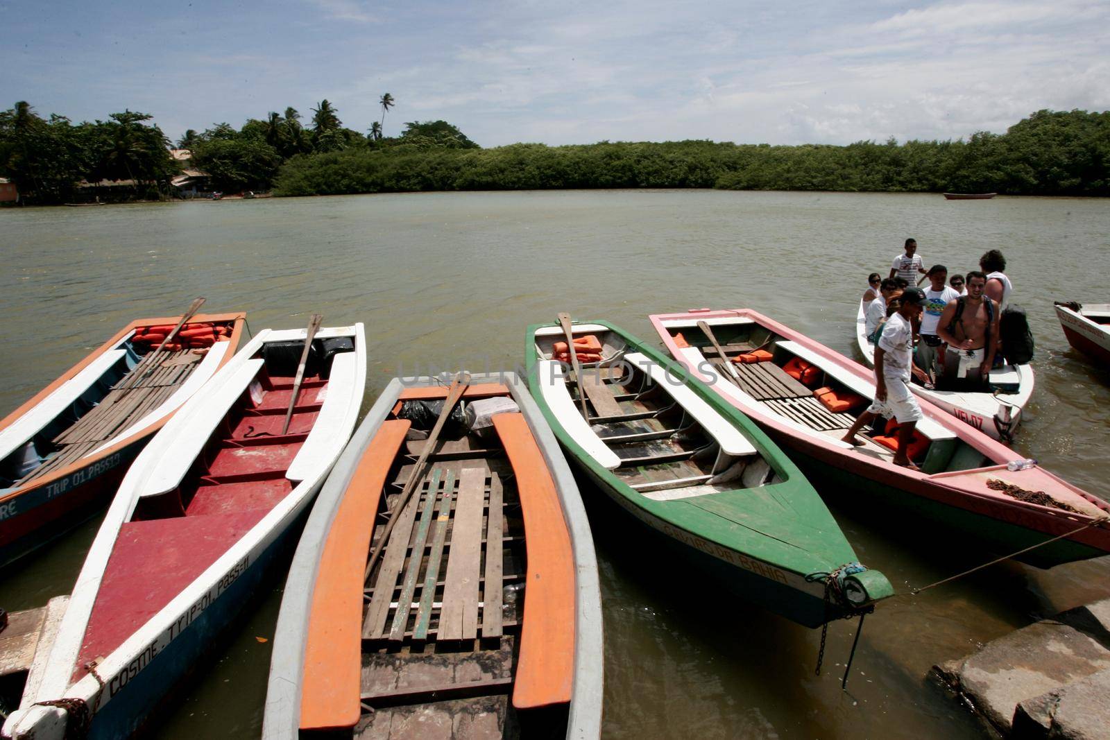 porto seguro, bahia / brazil - november 4, 2009: Tourist transport vessels are seen in the port of Rio Caraiva, Porto Seguro district.