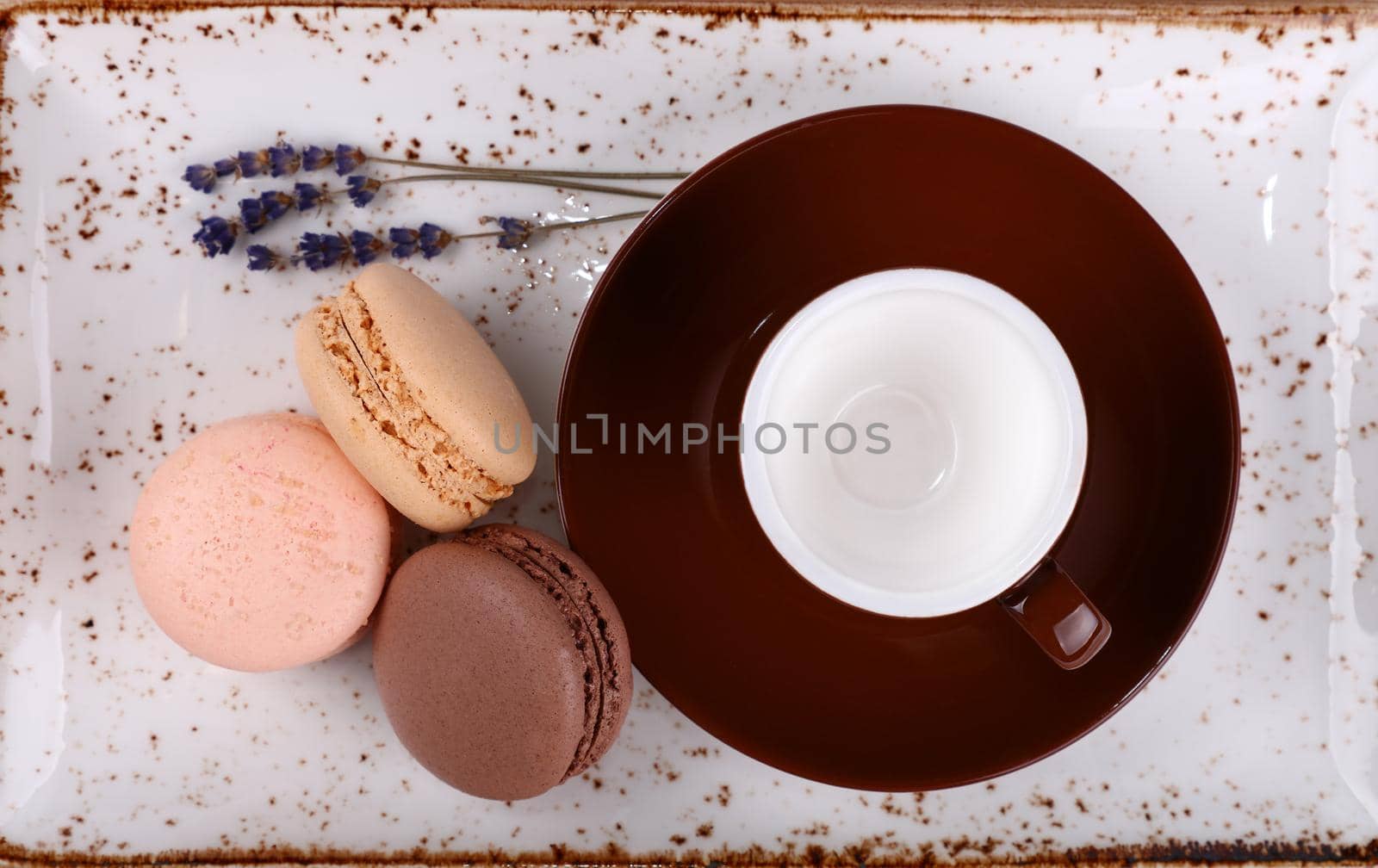 French macaroon cookies and brown coffee cup by BreakingTheWalls