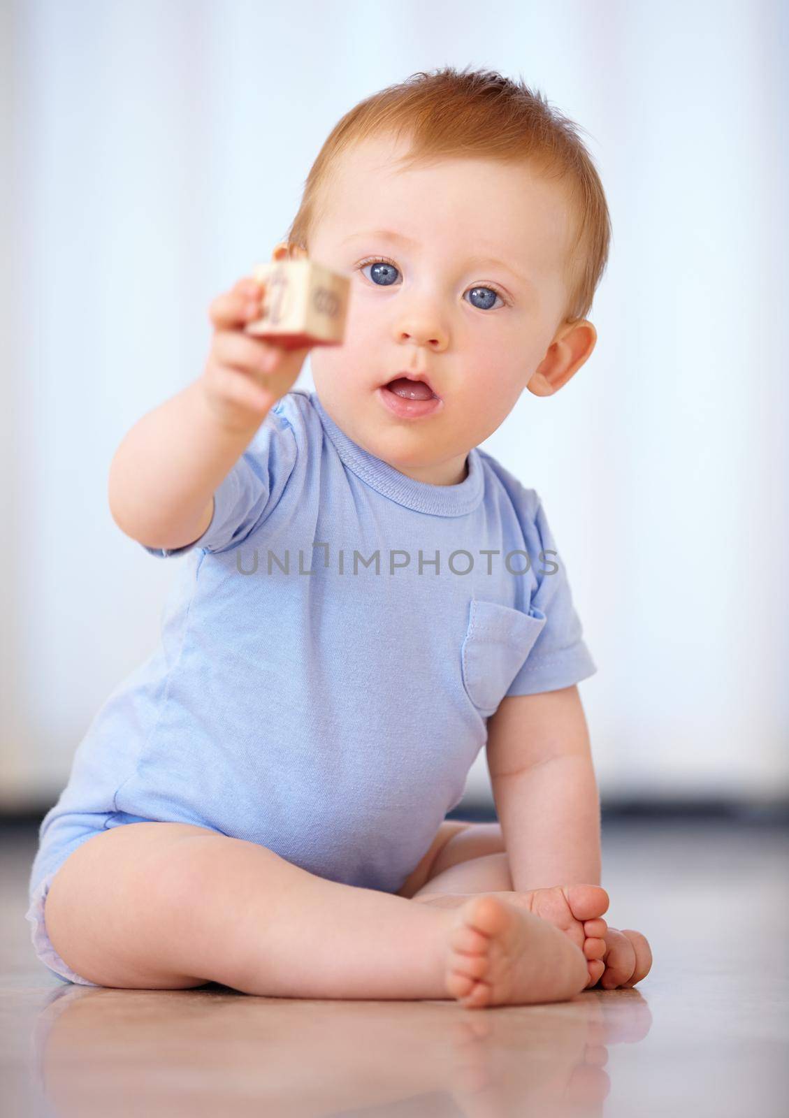 Growing up in the safety of home. an adorable baby boy in his home