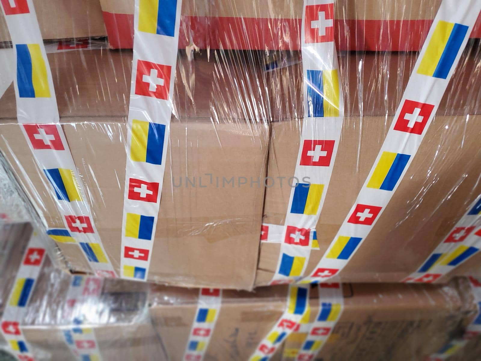 Boxes with humanitarian aid for Ukraine in volunteer centre warehouse. Dnipro, Ukraine - 06.30.2022