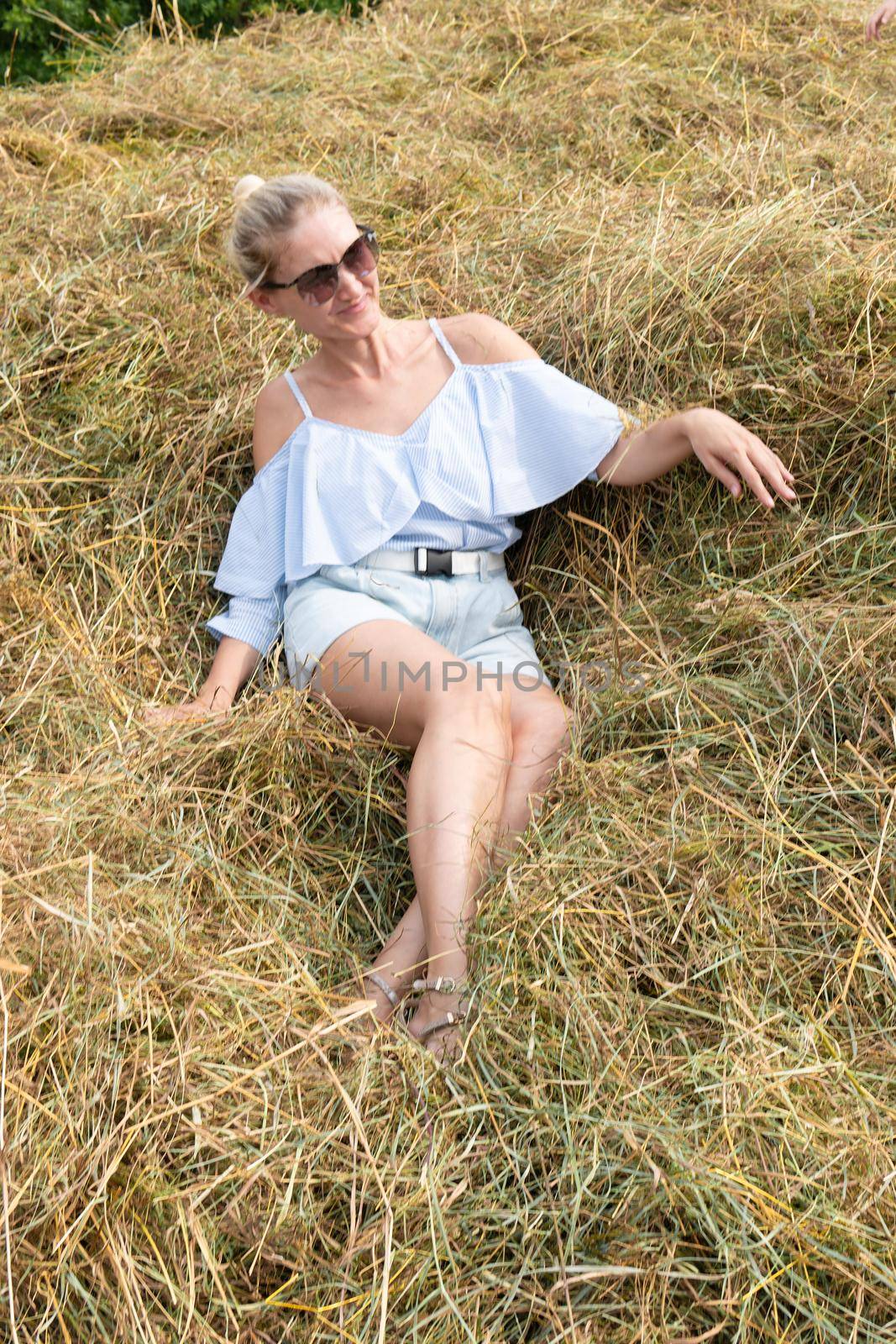 Travel happy girl fashion portrait sunglasses field freedom countryside, concept happiness woman from adventure from jacket slim, autumn hat. Village west meadow, sky