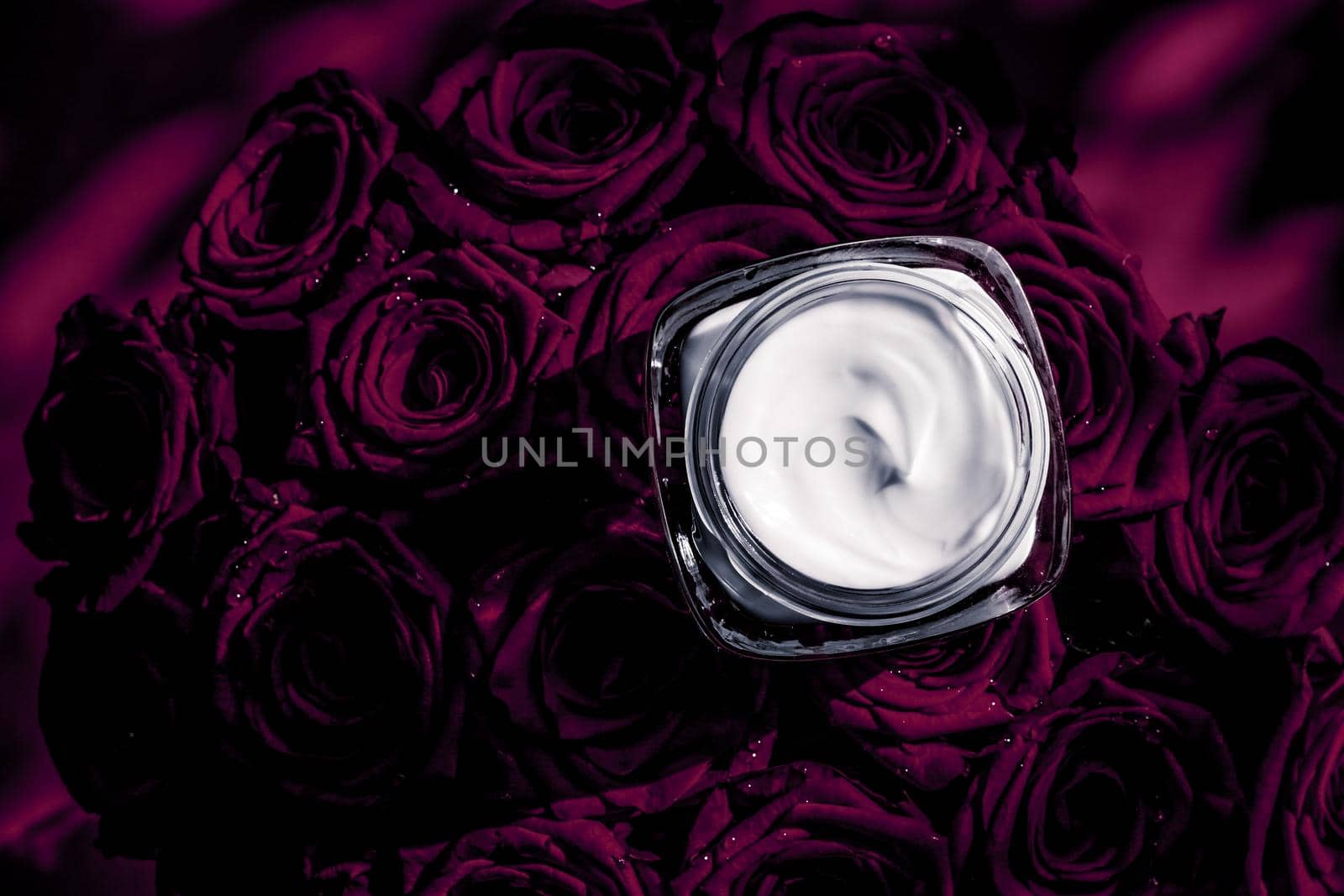 Luxe cosmetics, branding and anti-age concept - Face cream skin moisturizer and dark purple roses, luxury skincare cosmetic product on floral background as beauty brand holiday flatlay design