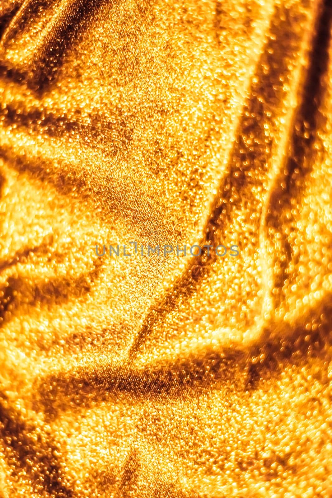 Golden holiday sparkling glitter abstract background, luxury shiny fabric material for glamour design and festive invitation by Anneleven