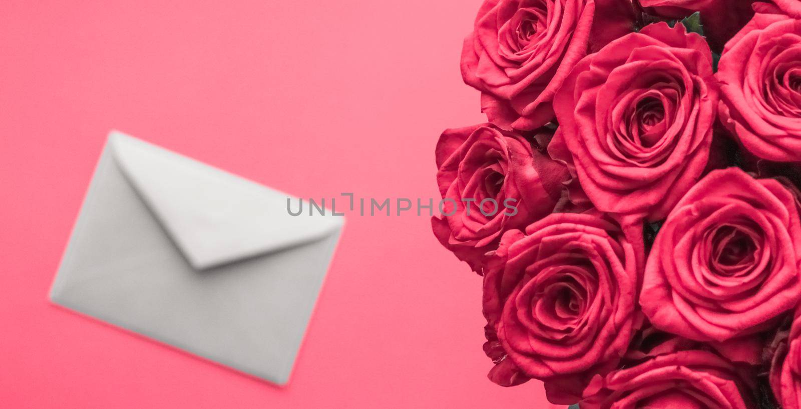 Holidays gift, floral present and happy relationship concept - Love letter and flowers delivery on Valentines Day, luxury bouquet of roses and card on pink background for romantic holiday design