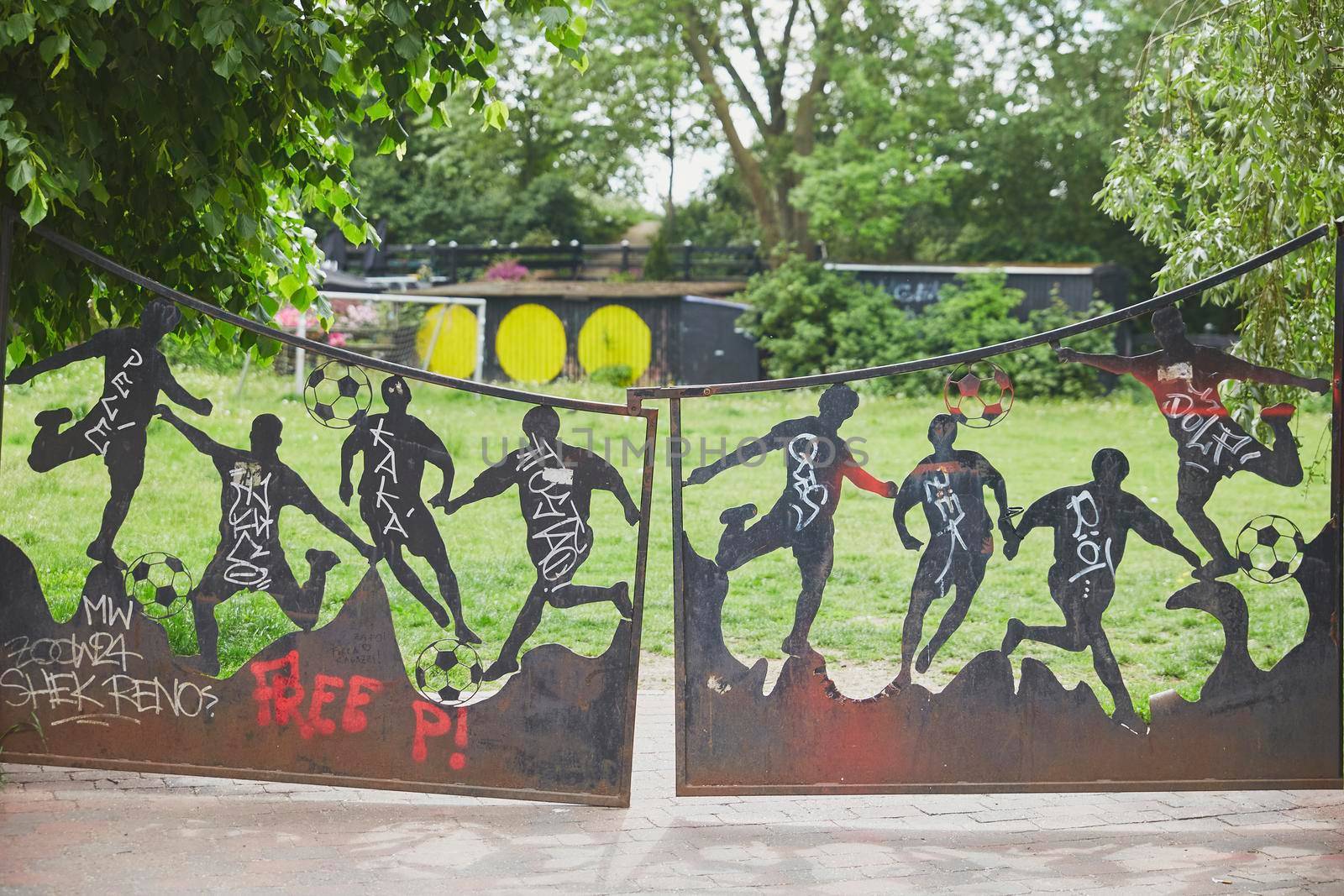 Copenhagen, Denmark, May, 2022: Gate to the football field in Christiania.