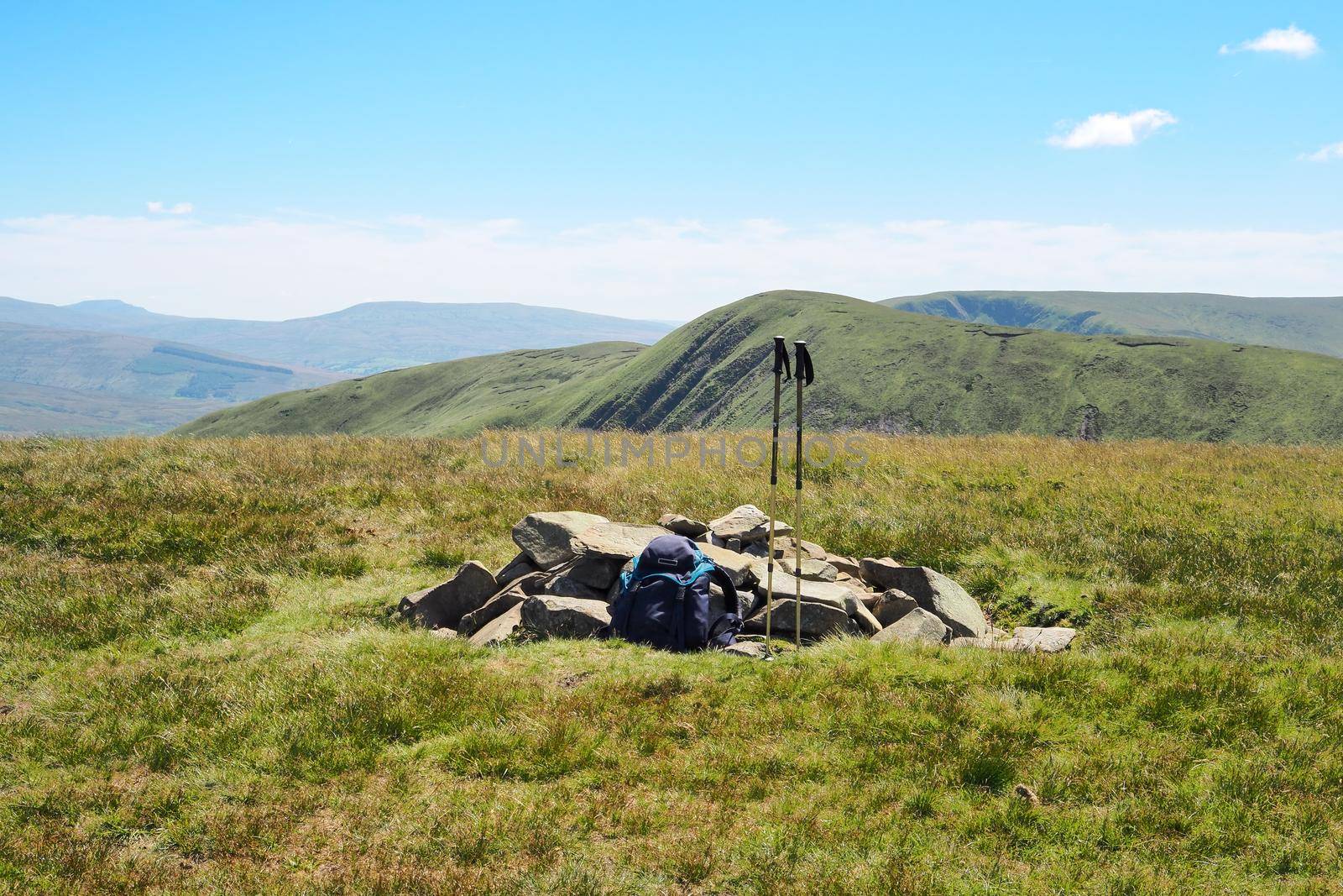 Rucksack and walking poles at summit of Randygill Top, Howgill Fells, Cumbria by PhilHarland