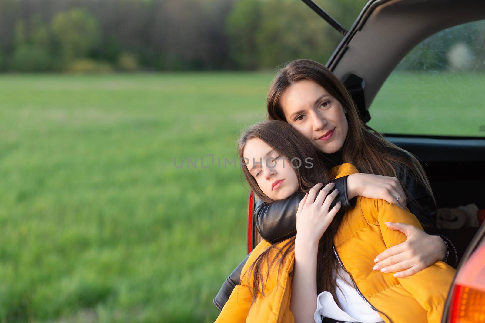 Mother and daughter camping on a hill by BY-_-BY