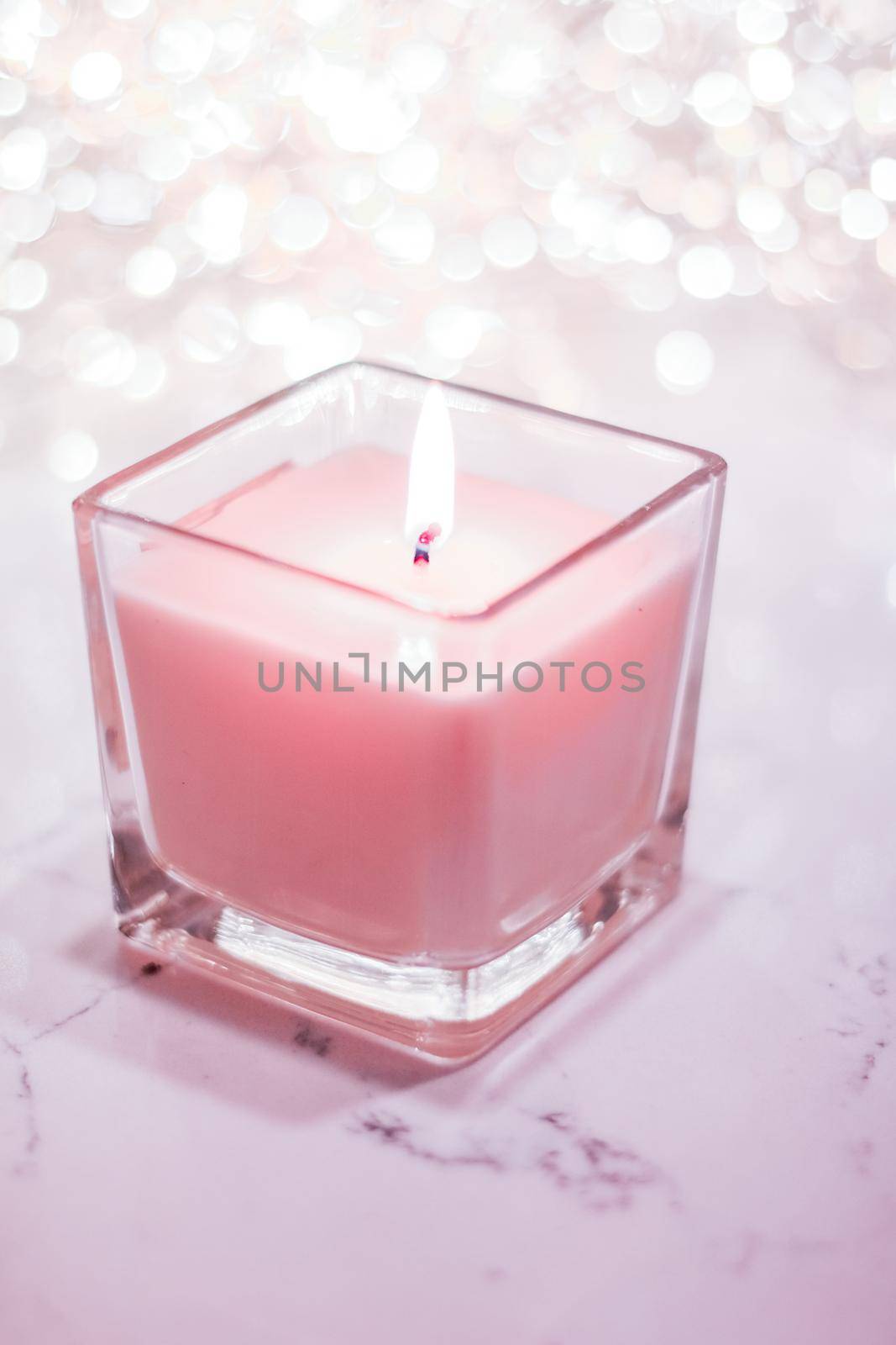 Festive decoration, branding and aromatherapy spa concept - Rose aromatic candle on Christmas and New Years glitter background, Valentines Day luxury home decor and holiday season brand design