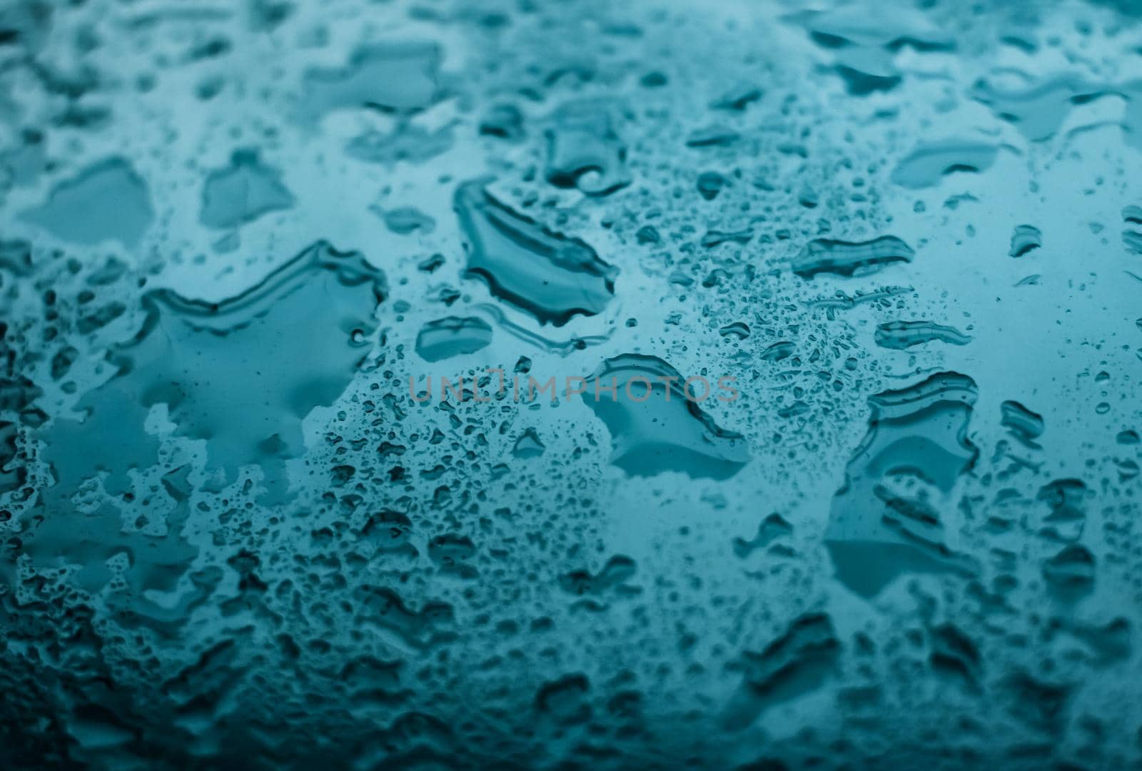 Liquid, wet and zen concept - Water texture abstract background, aqua drops on turquoise glass as science macro element, rainy weather and nature surface art backdrop for environmental brand design