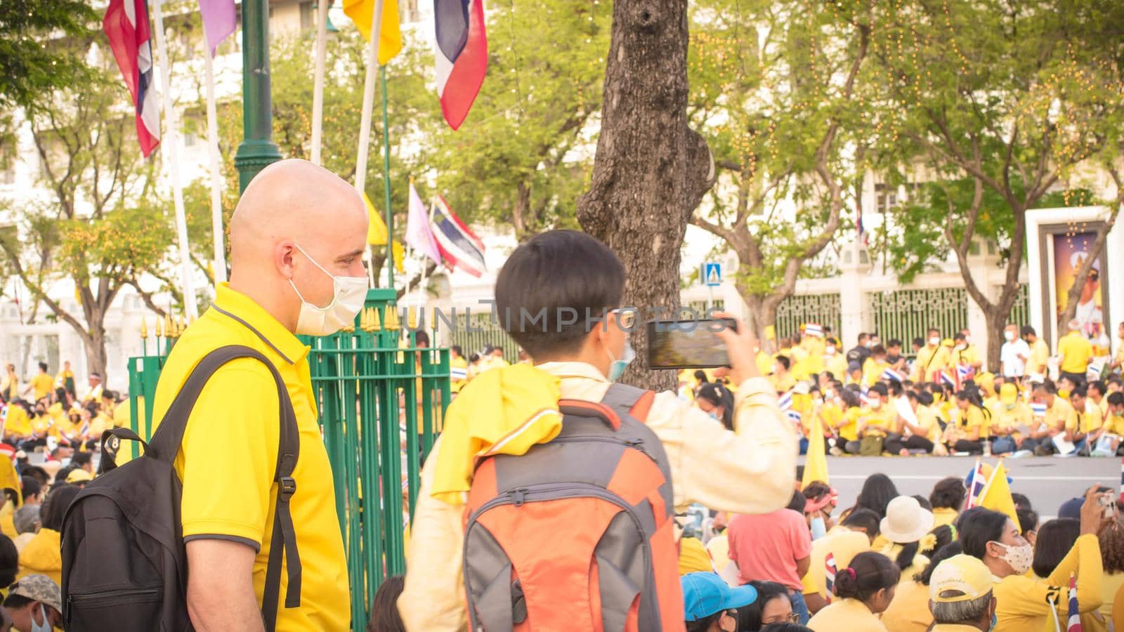 2020 November 01 Bangkok Thailand wearing yellow shirts rally in support of monarchy