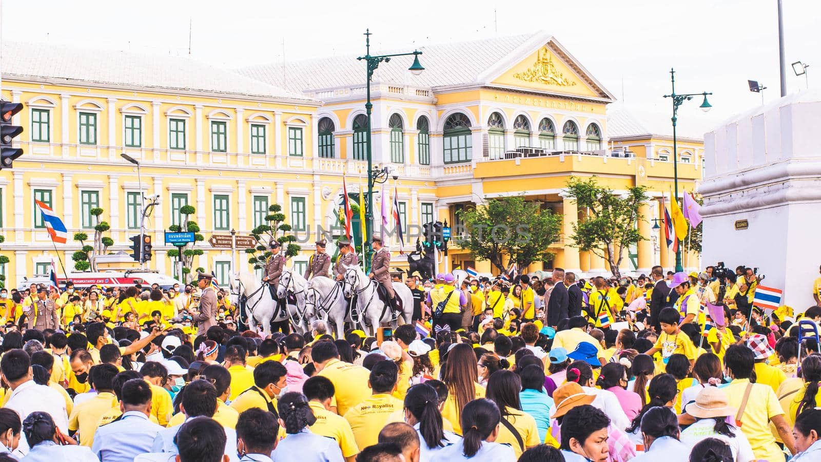 2020 November 01 Bangkok Thailand wearing yellow shirts rally in support of monarchy by Petrichor
