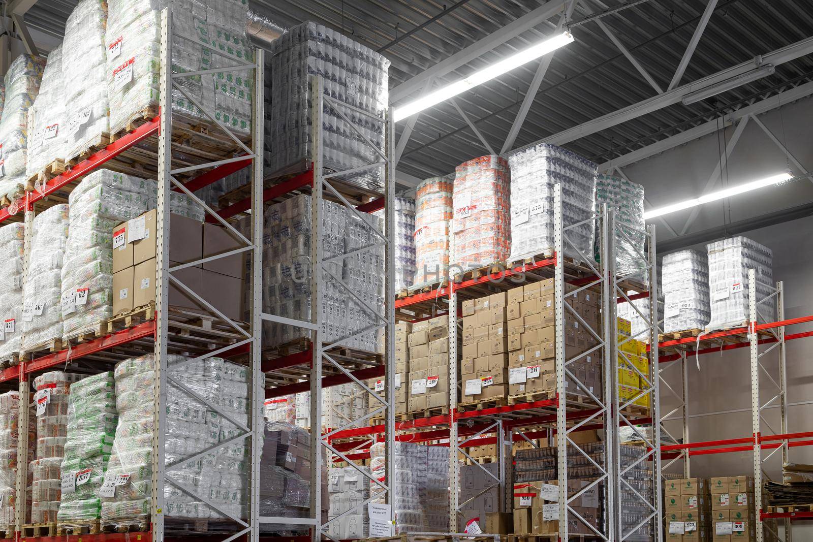 large storage center with aluminum shelving.
