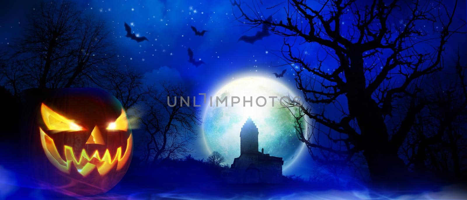 Halloween background with graveyard in a spooky night.