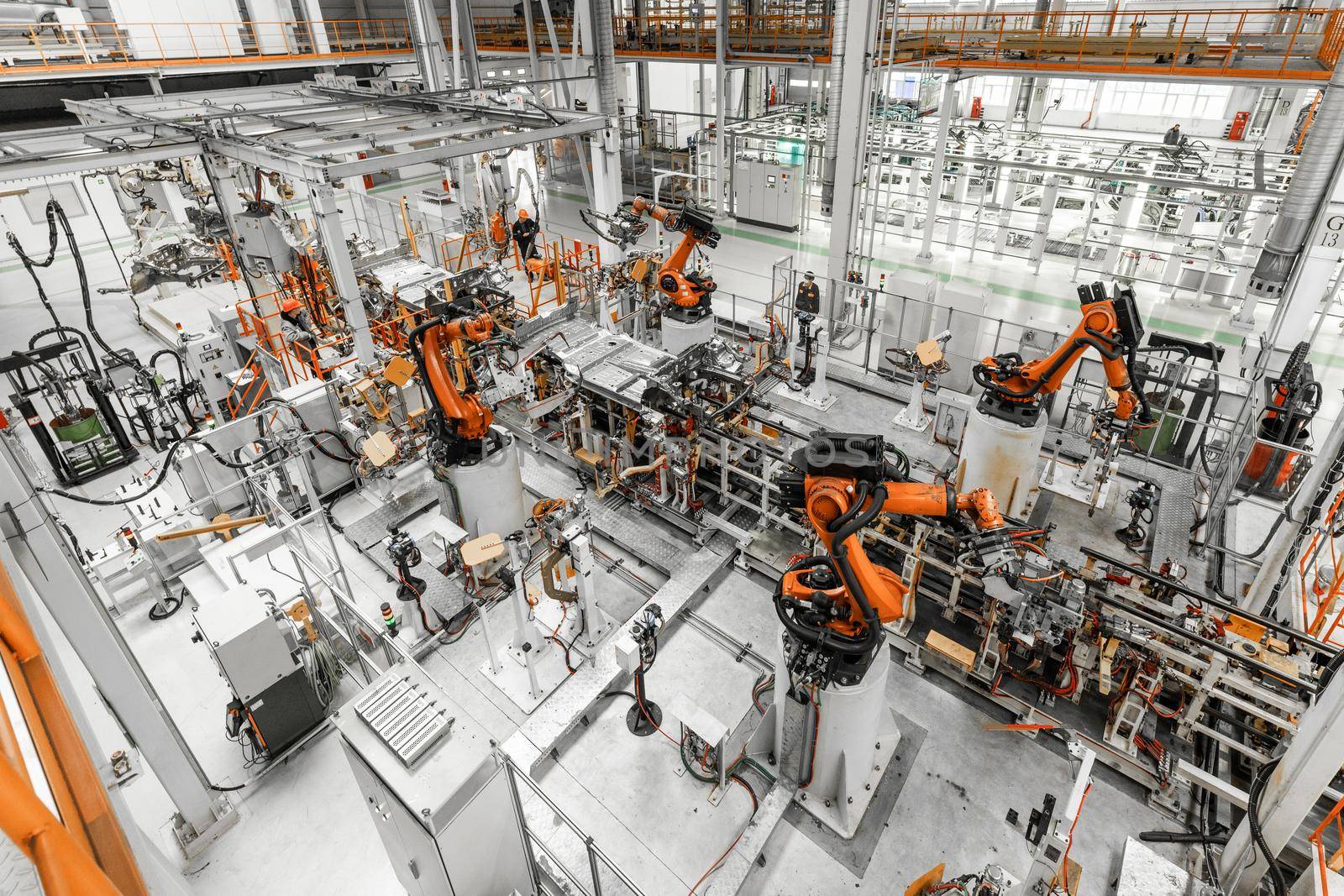 Automobile production line. Welding car body. Modern car assembly plant. Top view.