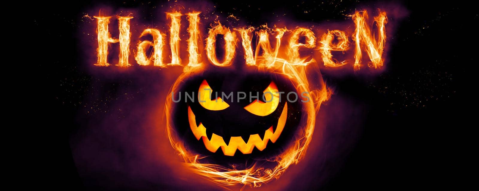 Halloween pumpkin face with burning fire inside. by Taut