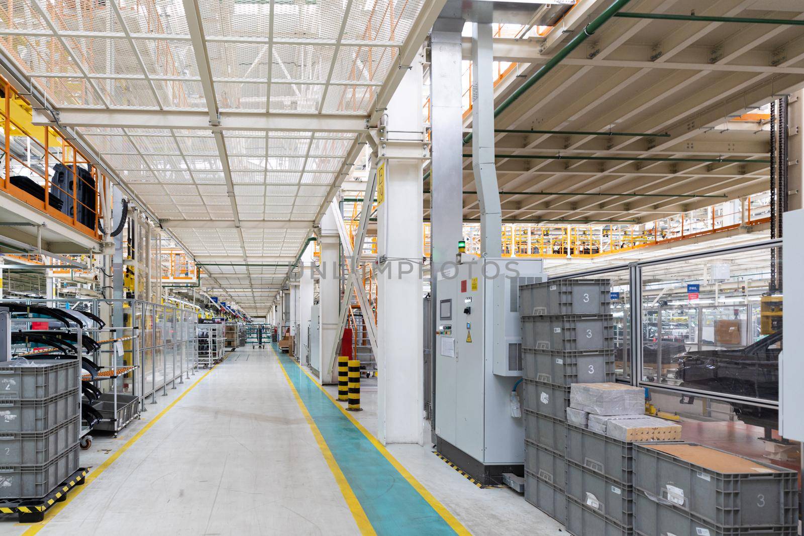 Factory for production of cars. Modern automotive industry. Interior of plant.