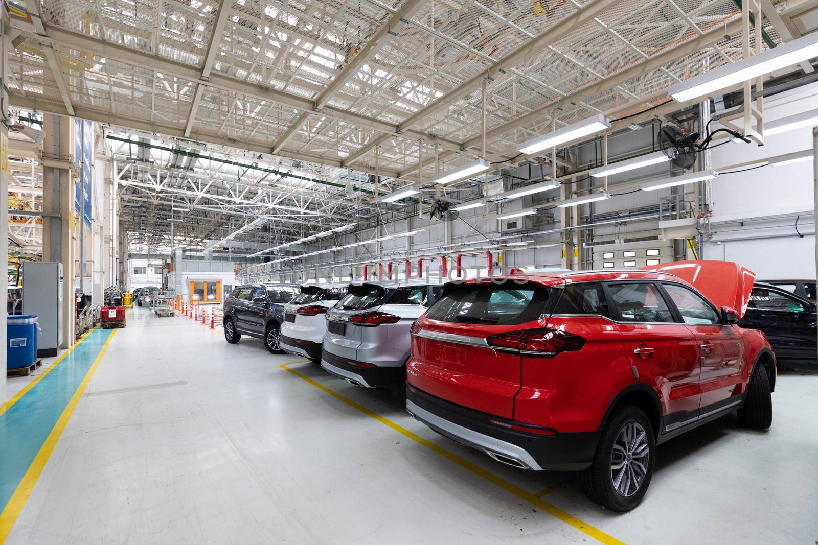Modern car assembly plant. Auto industry. Interior of a high-tech factory, modern production.
