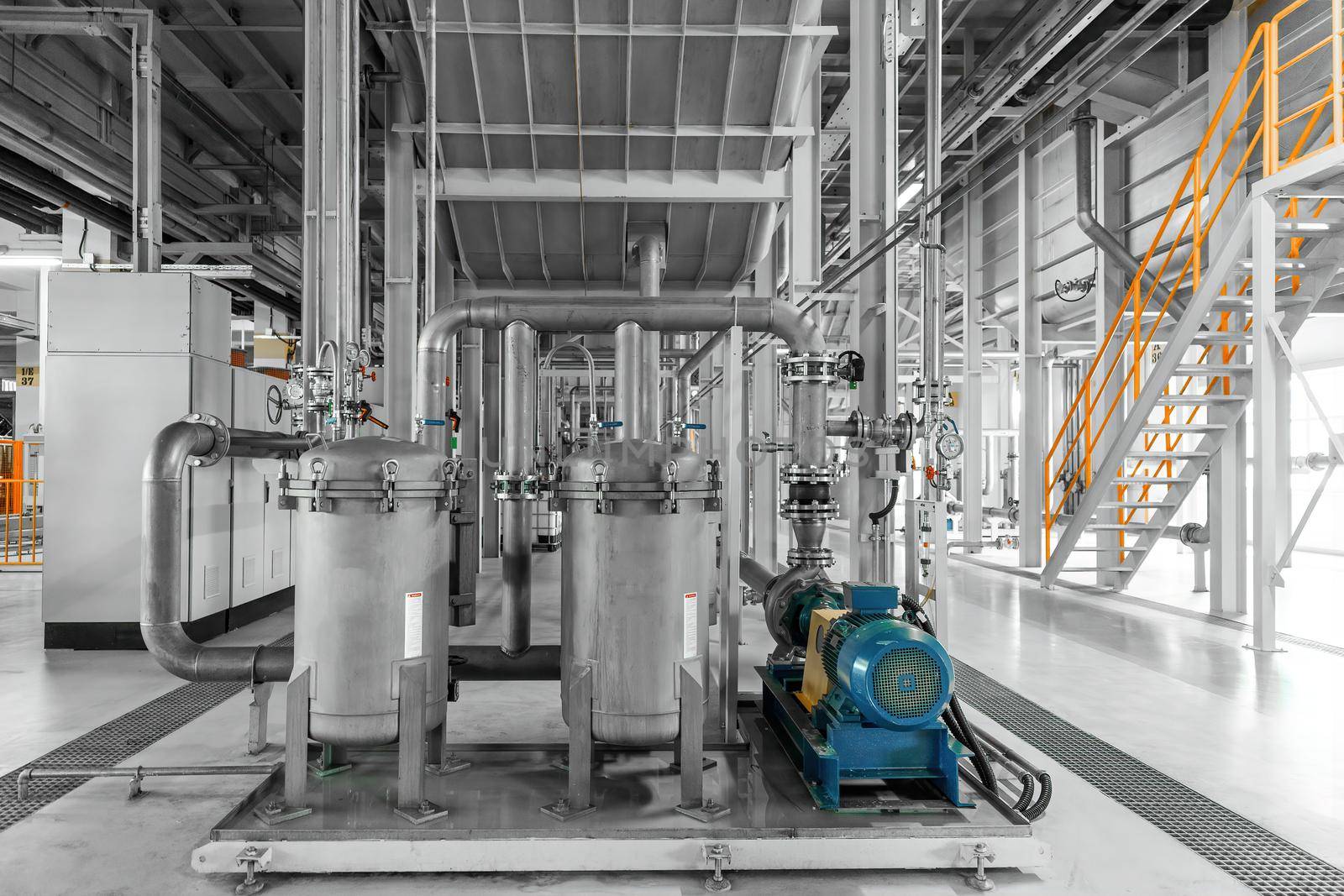 Photo of pipes and tanks. Chemistry and medicine production. Pharmaceutical factory.