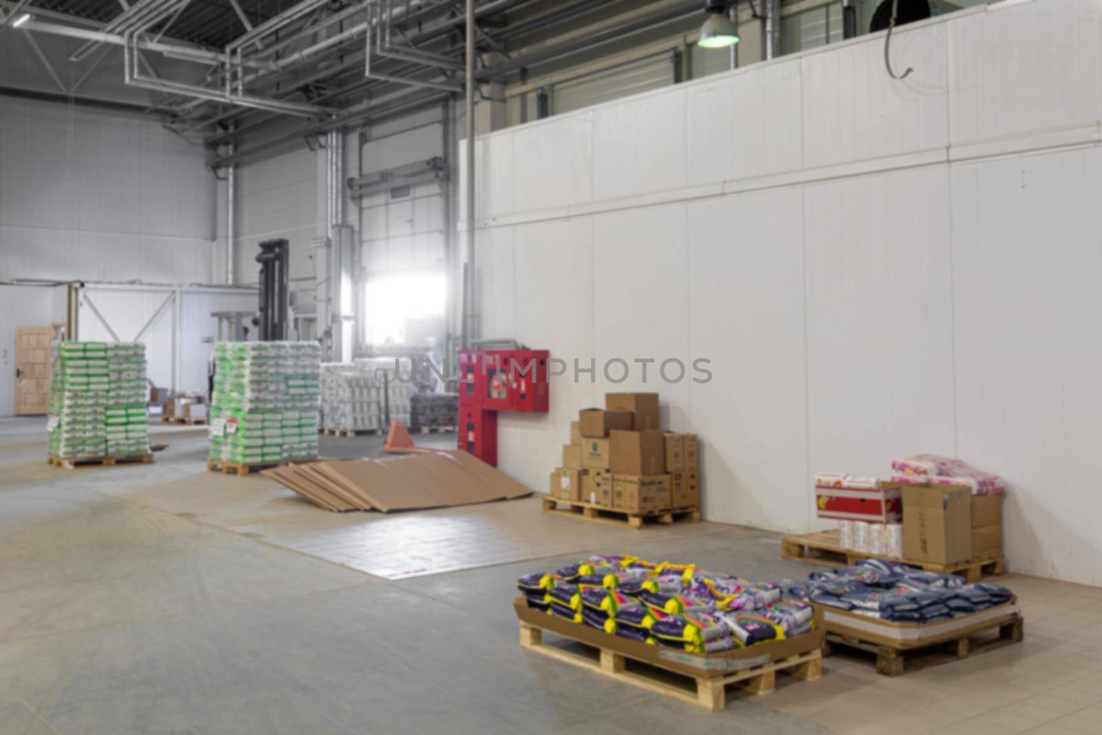 warehouse center with flights and goods on them, blurred photography, defocus by TRMK
