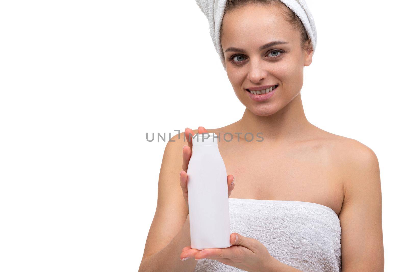 cosmetic Concept, a woman holding a jar of shampoo in her hands after a shower
