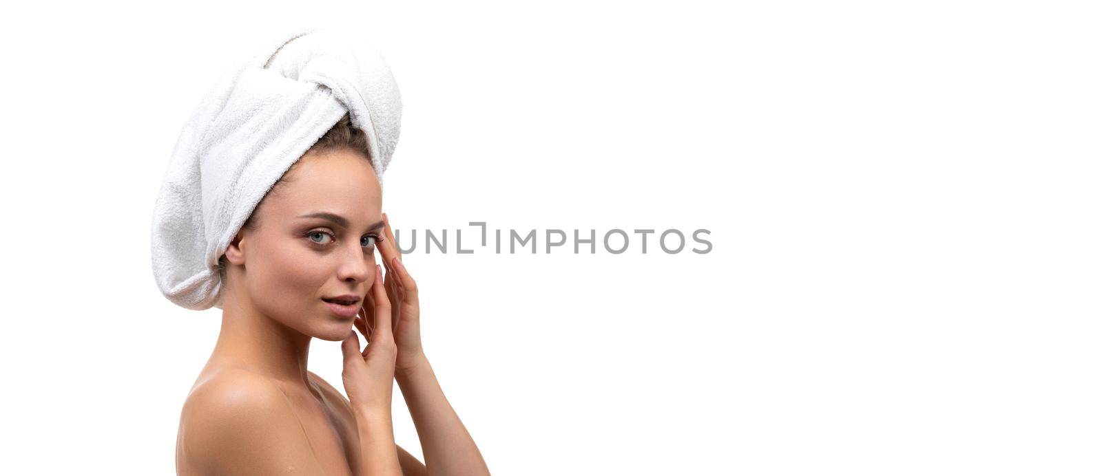 middle aged woman with well groomed skin touches her face with her hands, cosmetic concept of skin care for age.