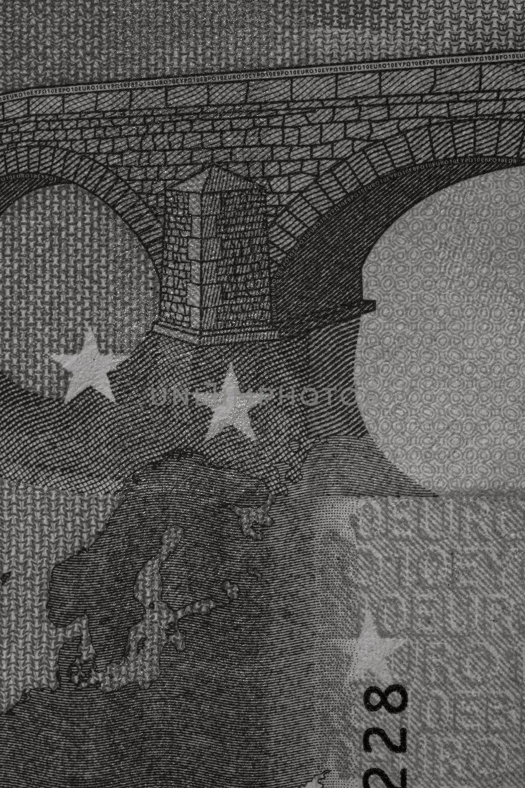 Selective focus on detail of euro banknotes. Close up macro detail of money banknotes, 10 euro isolated. World money concept, inflation and economy concept