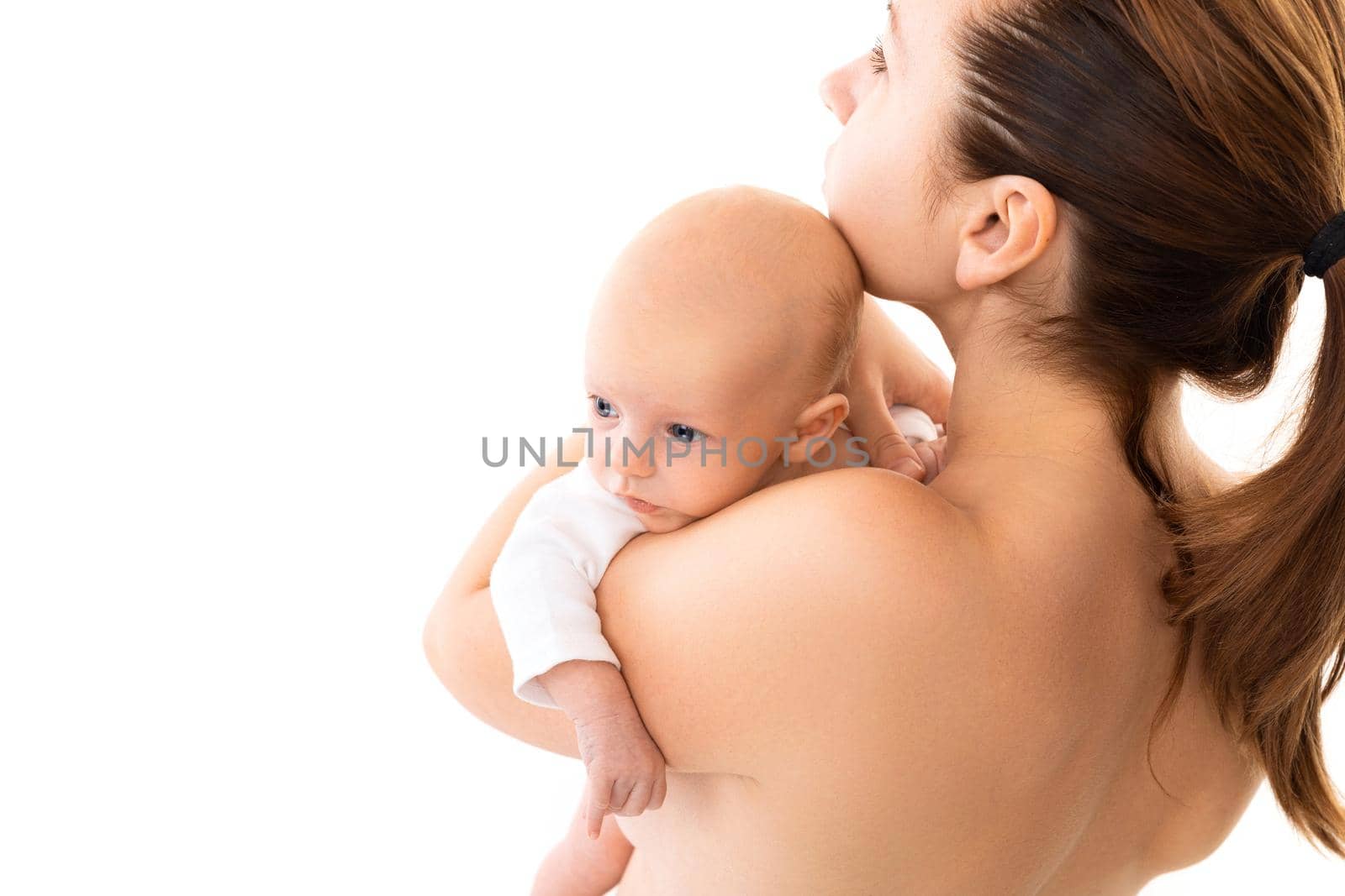 baby on mother's breast on a white background, Concept of caring for the health of a newborn baby, vaccination and vaccinations, care and feeding by TRMK